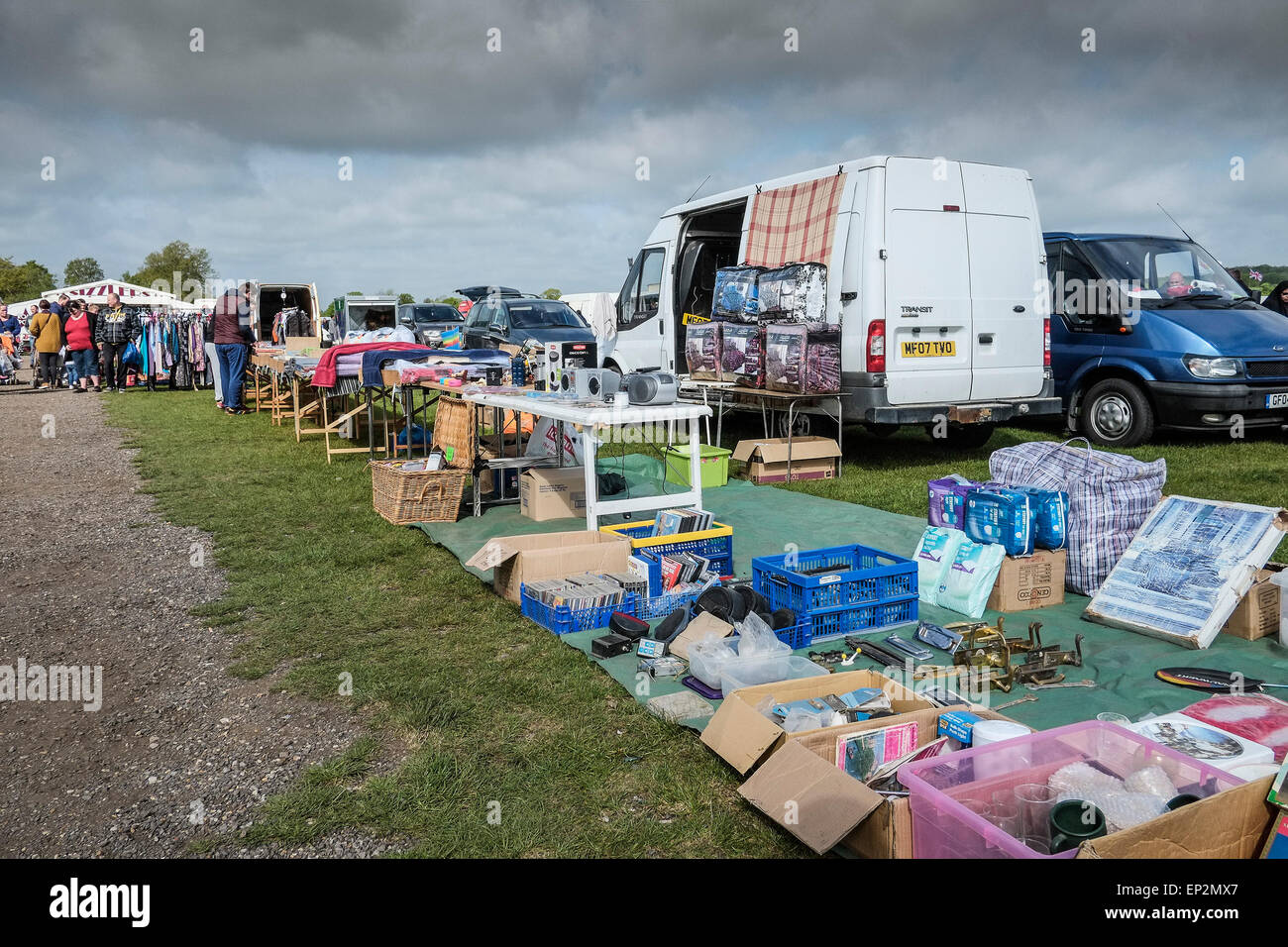 People buying and selling at a car boot sale in Essex. Stock Photo