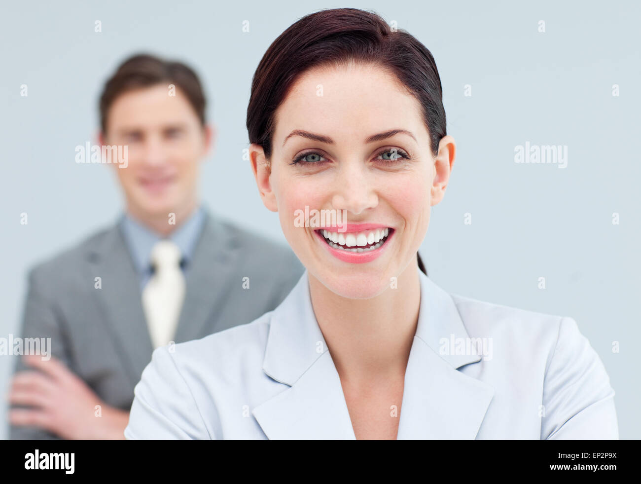 Cheerful business people standing in a row Stock Photo - Alamy