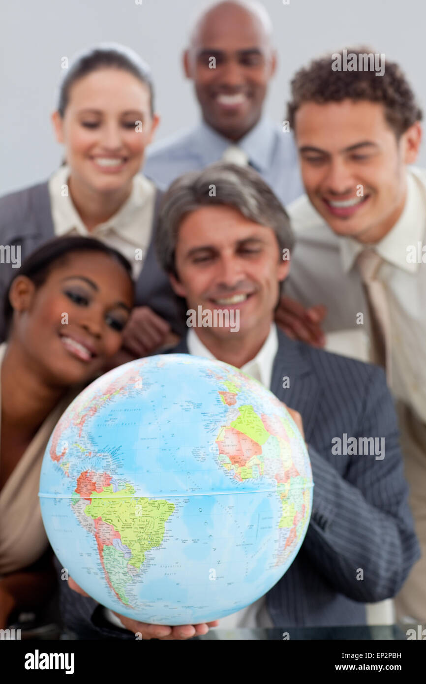 Business group showing diversity holding hi-res stock photography and ...
