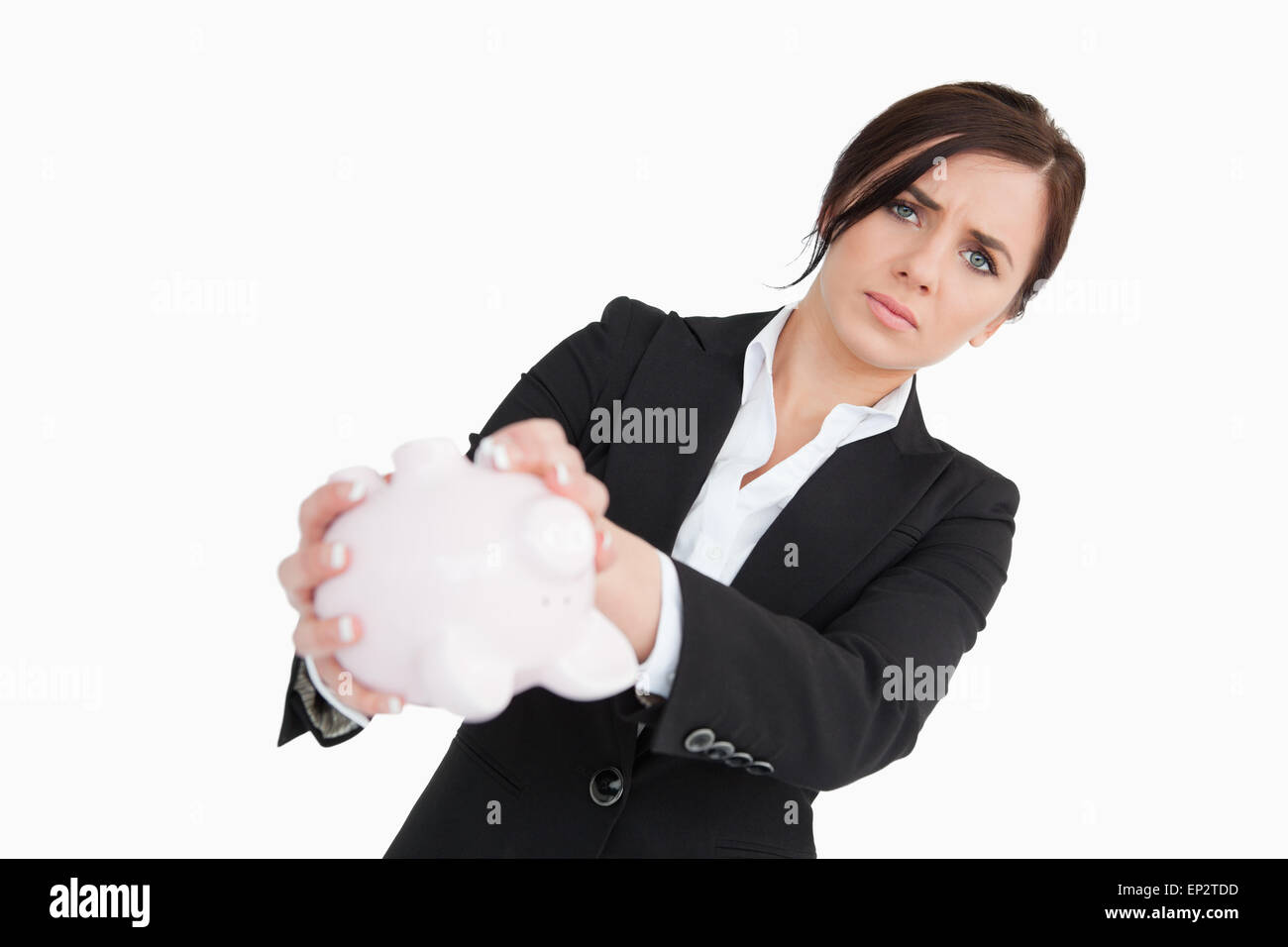 Upset businesswoman holding an empty piggy bank Stock Photo - Alamy