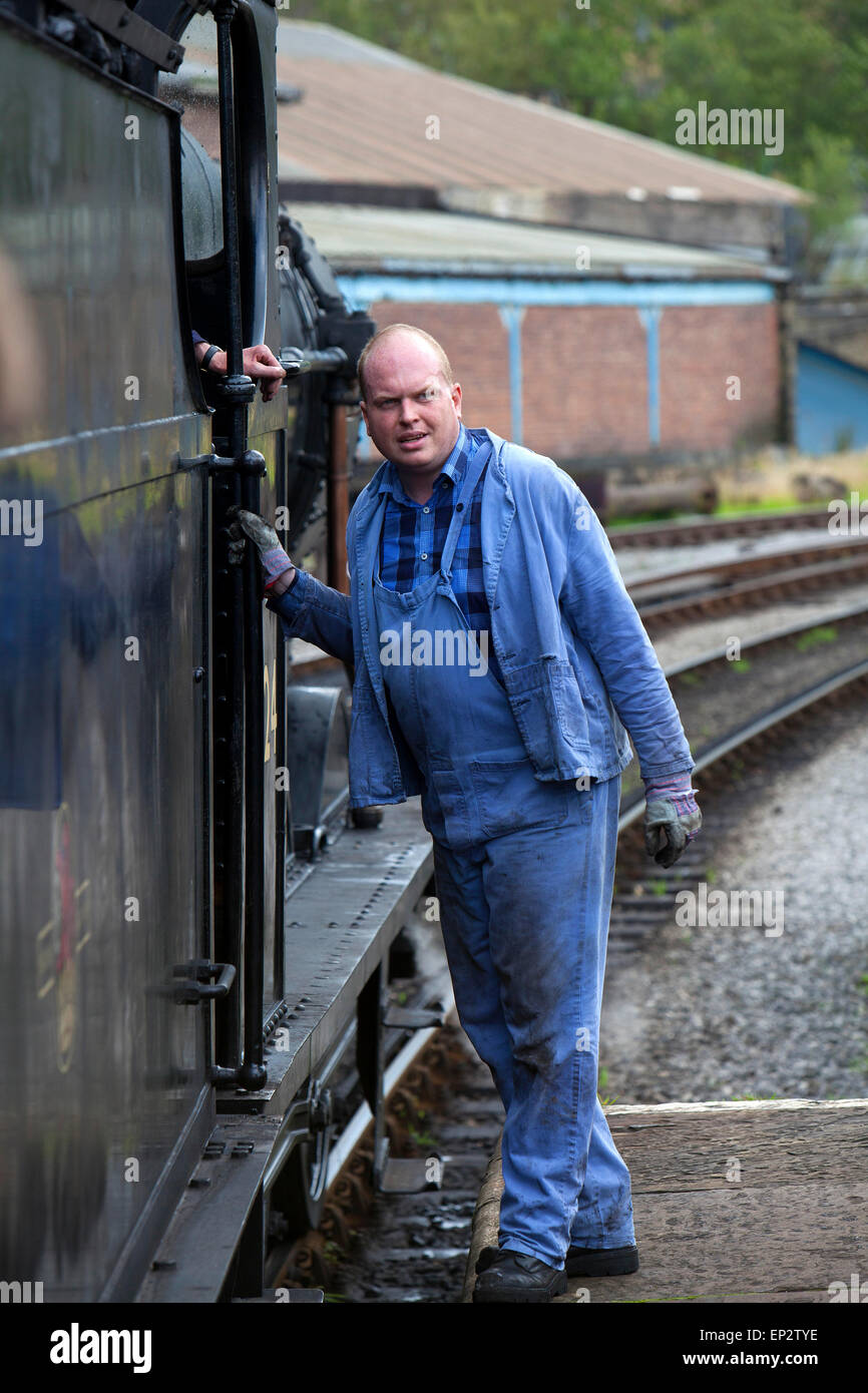 train driver on a steam locomotive at the Keighley and Worth Valley ...
