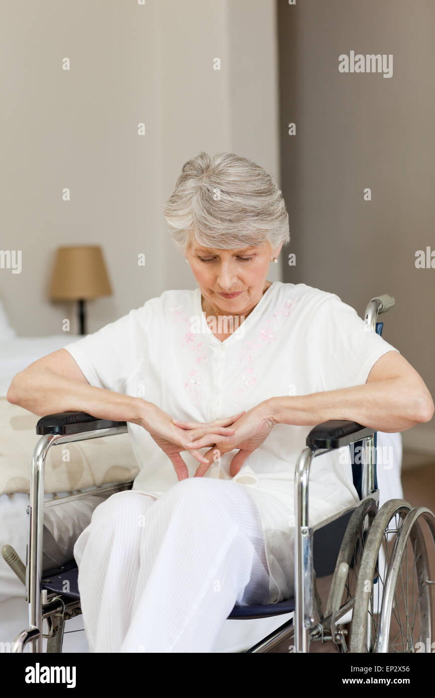 Senior woman asleep in her wheelchair at home Stock Photo Alamy