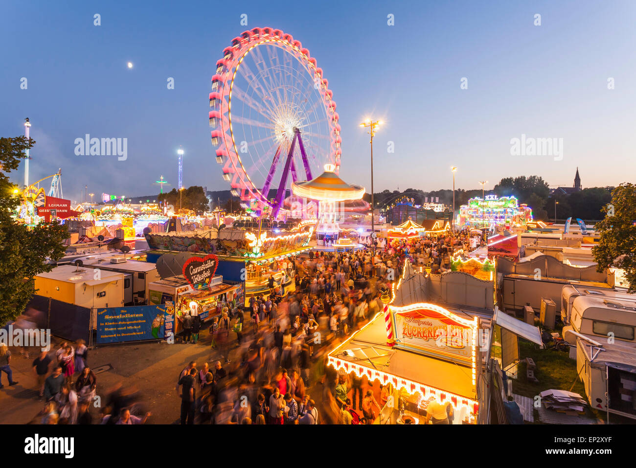 Germany, Stuttgart, Cannstatter Wasen fairground at night Stock Photo