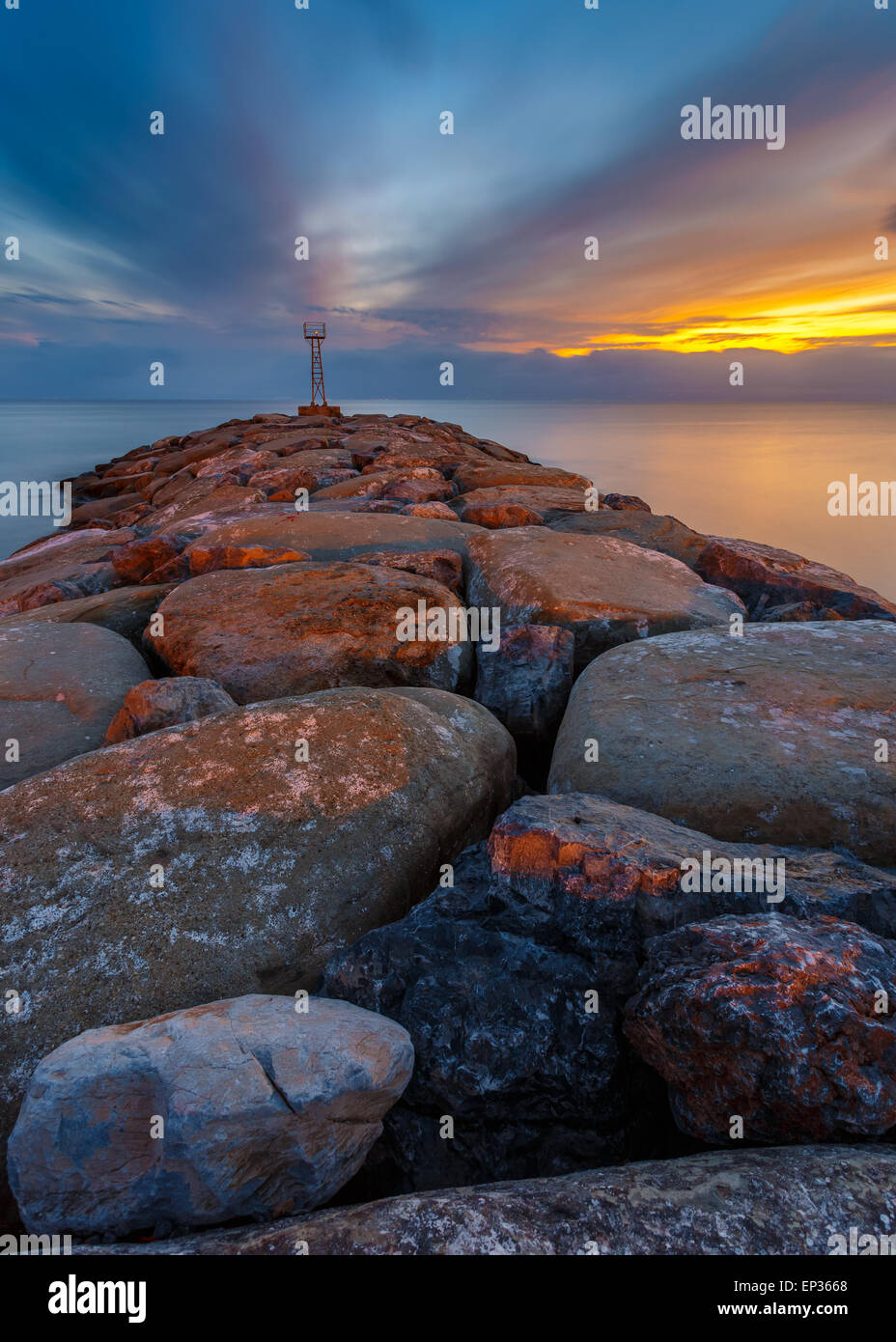 Light beacon and rocky wave breaker near Acroyali village, Messinia ...