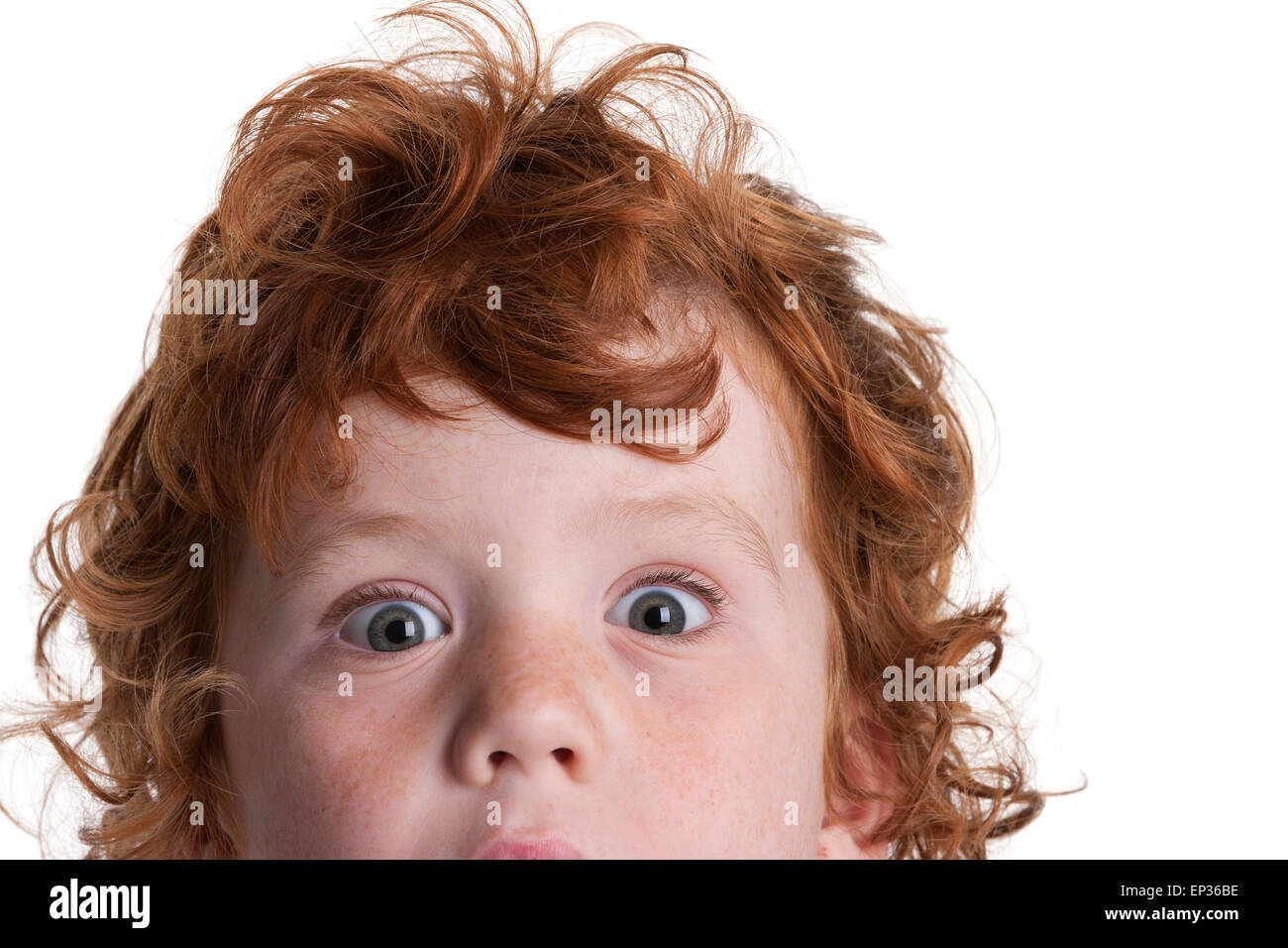 Half Portrait Of A Curly Red Haired Boy On White Background Stock Photo Alamy