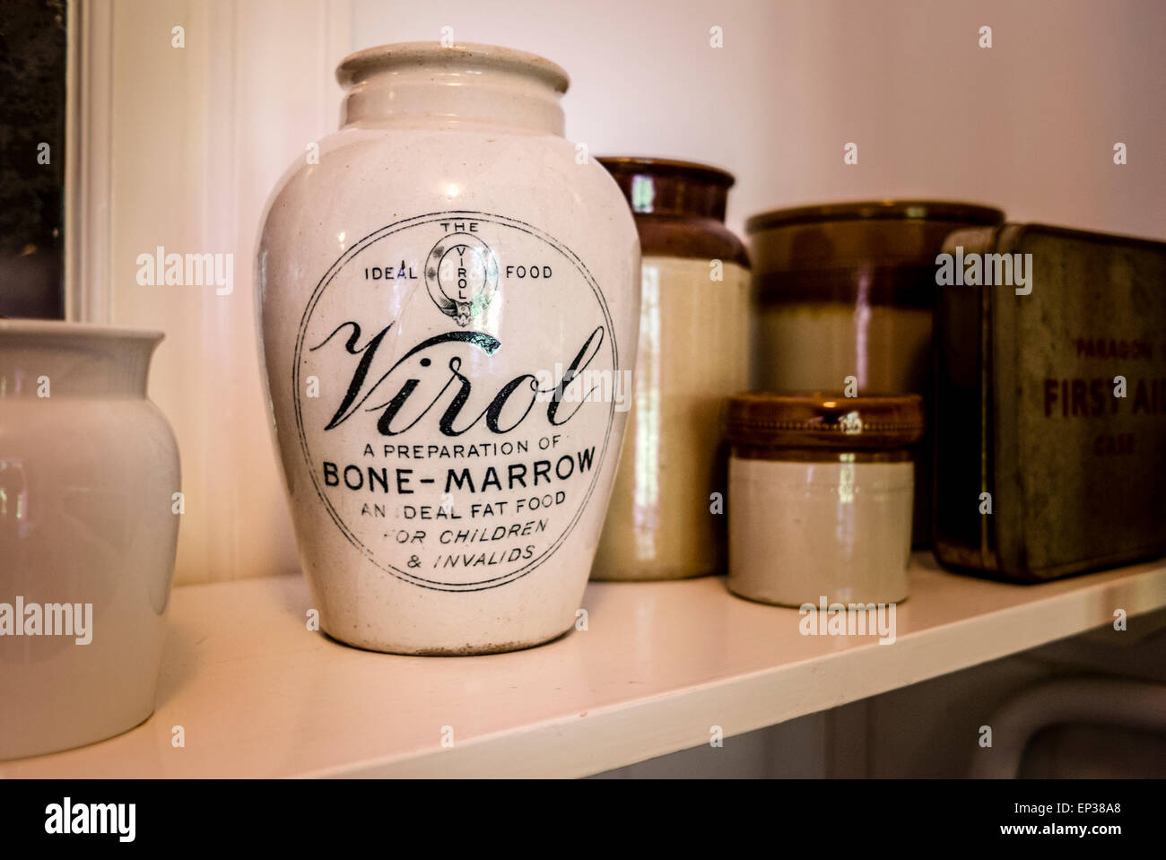 Old Virol jar on shelf in historic home open to the public illustrating life in Victorian Britainu Stock Photo