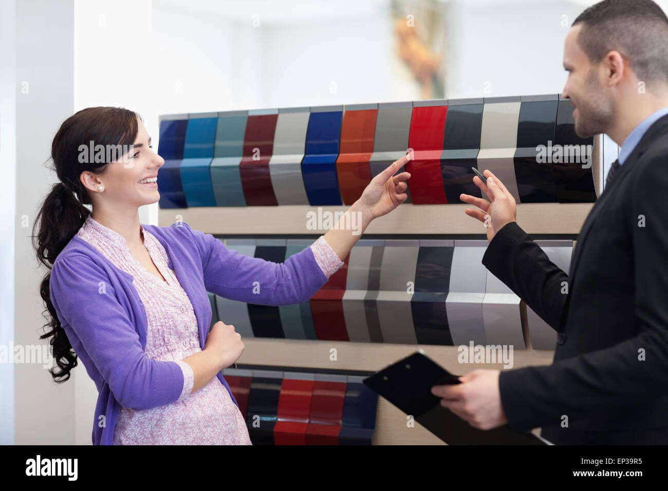 Man and woman choosing color in a color palette Stock Photo - Alamy