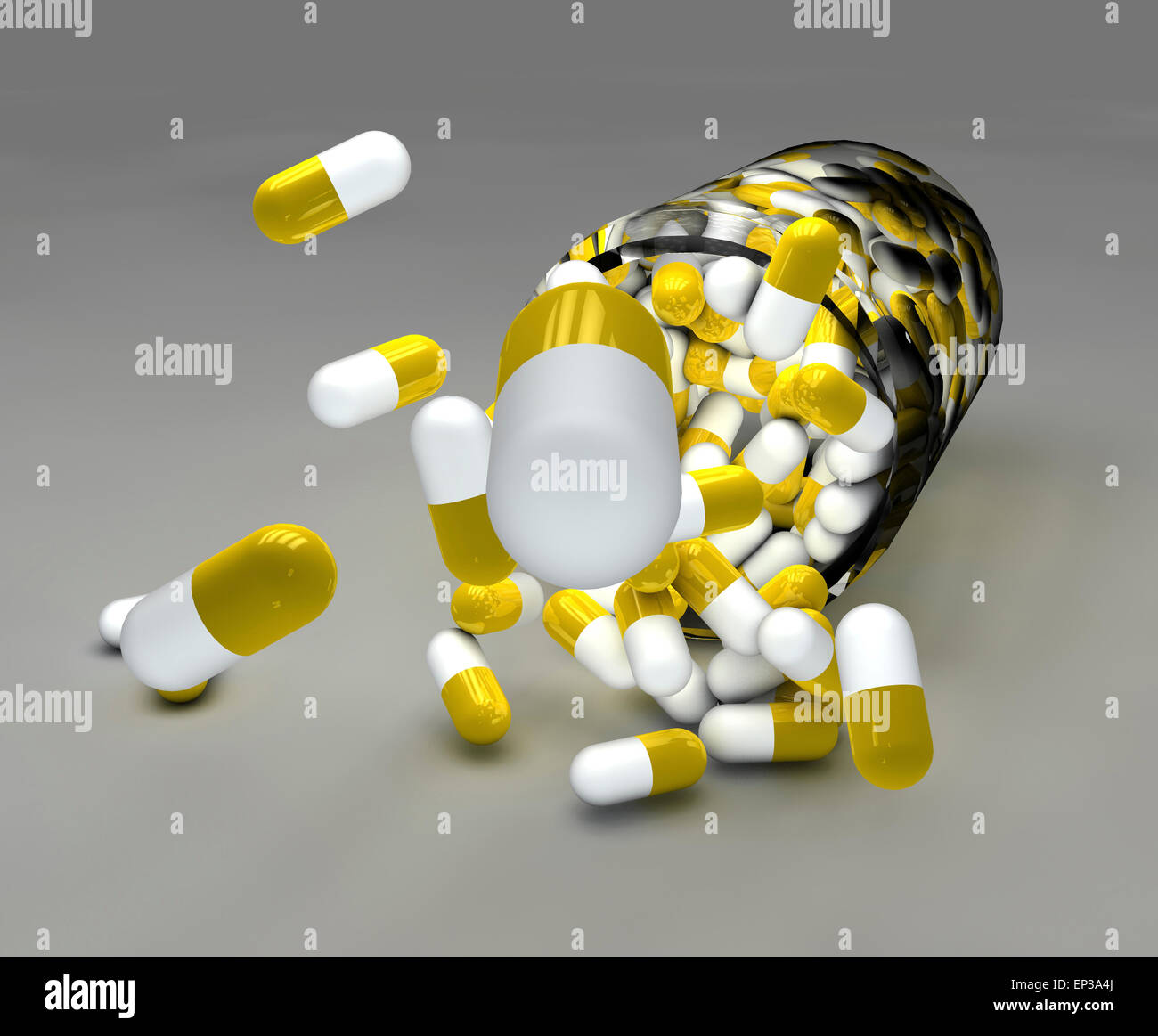 Spilled yellow and white pills with bottle on gray background Stock Photo