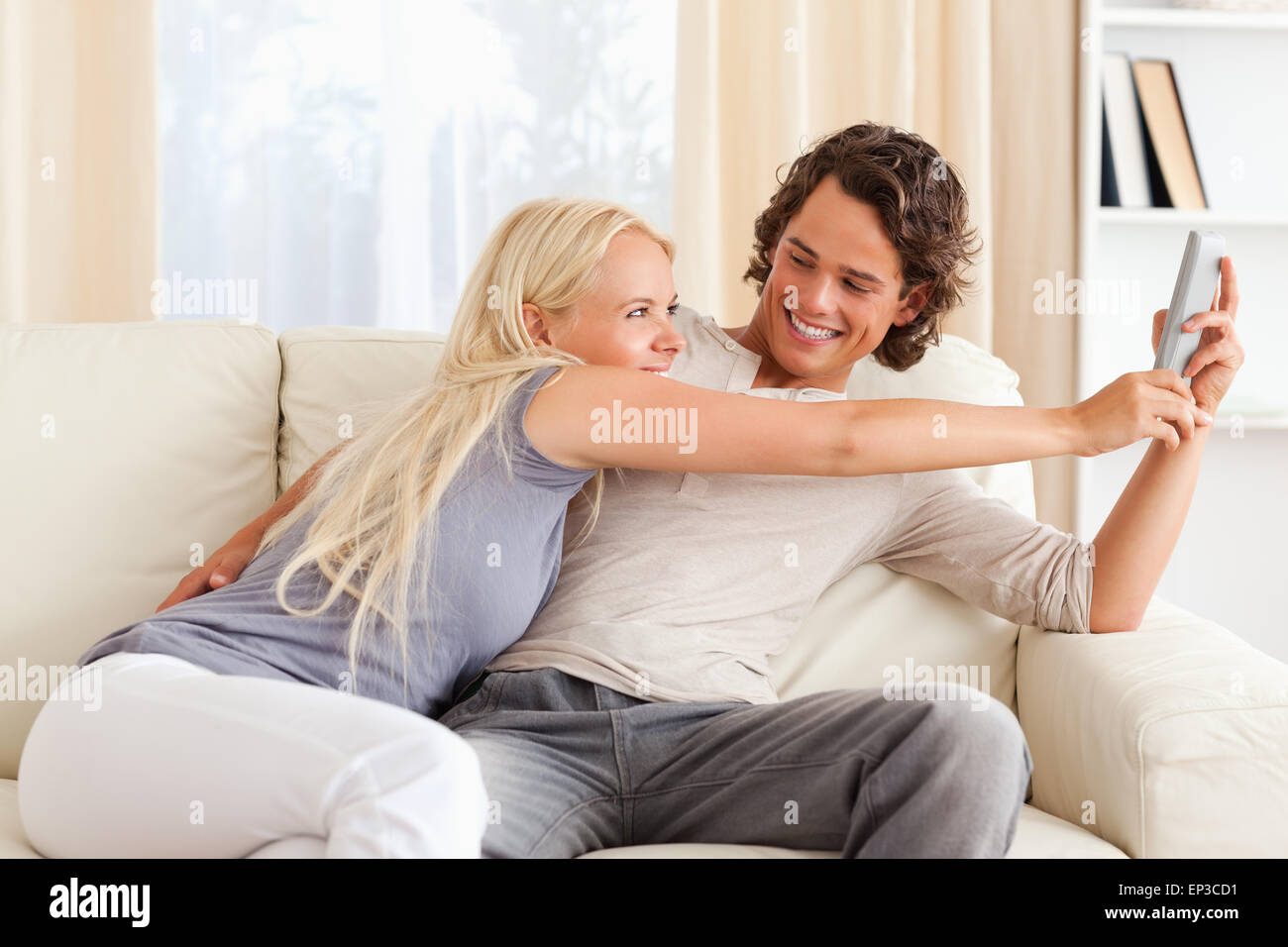 Women watch two men fighting hi-res stock photography and images - Alamy