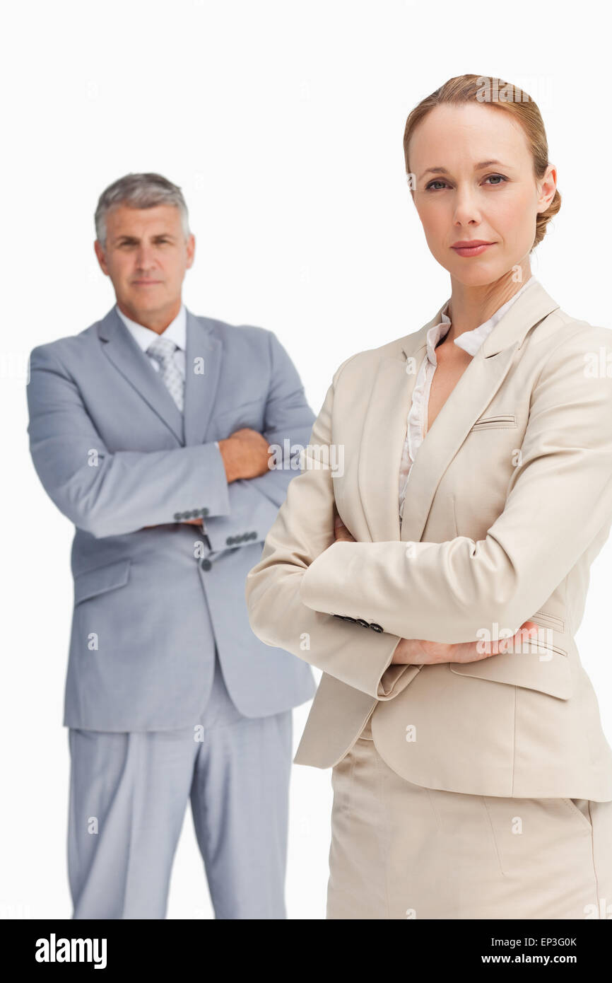 Close-up of a serious business people with folded arms Stock Photo - Alamy