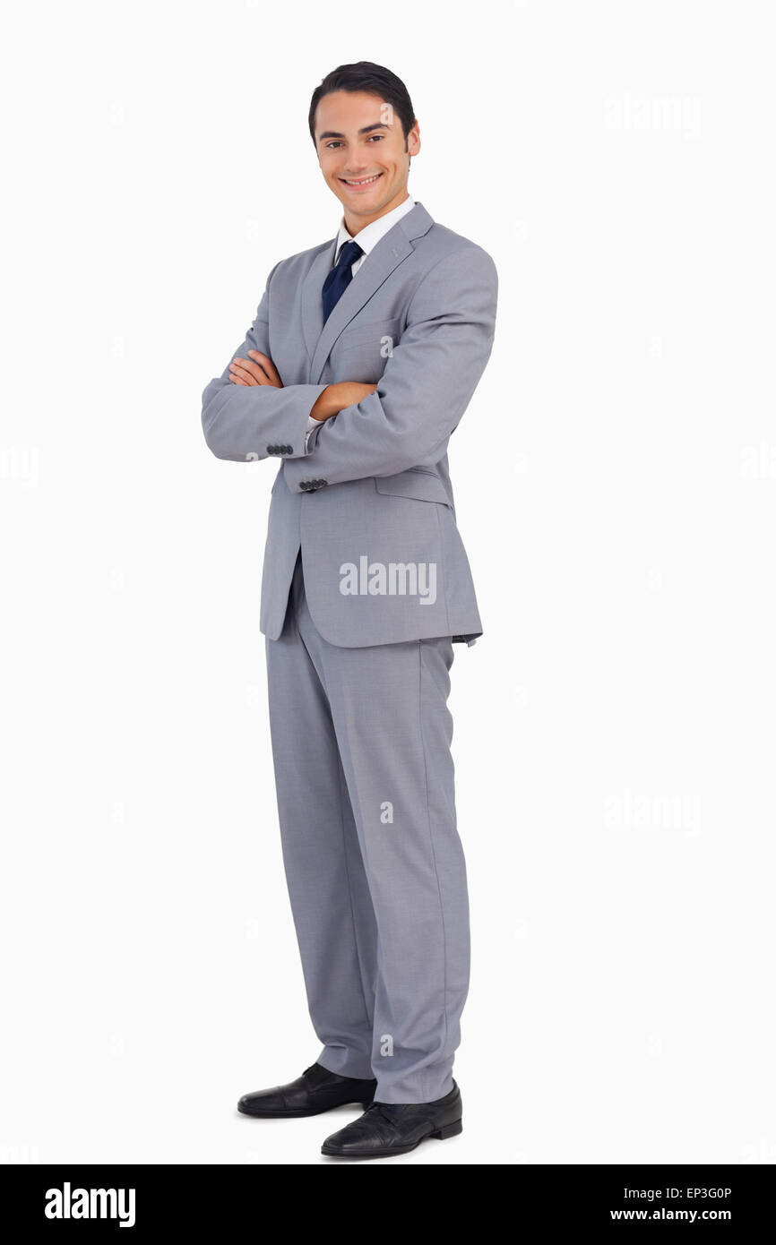 Portrait of a businessman smiling with crossed arms Stock Photo - Alamy