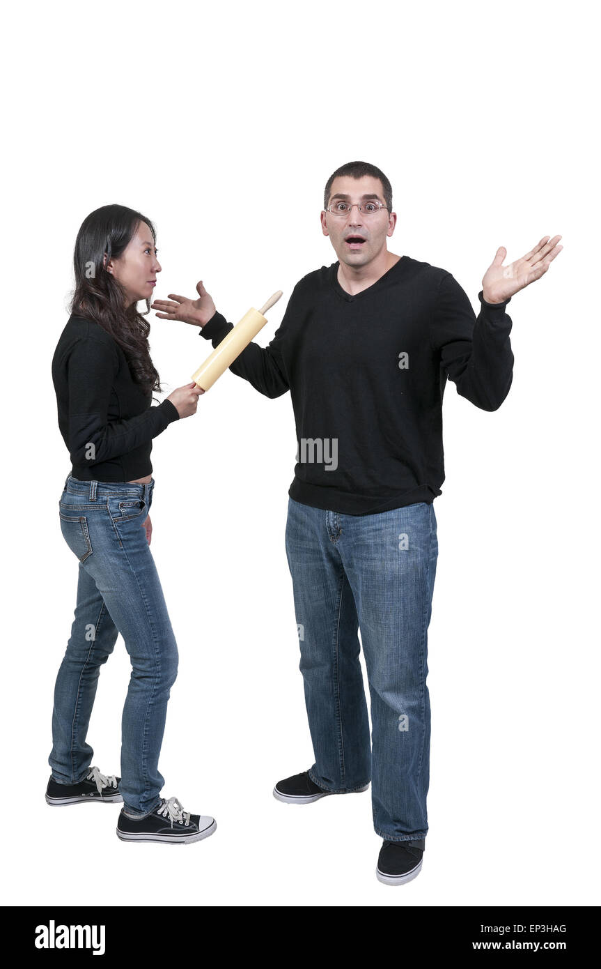 Woman Chasing man with Rolling Pin Stock Photo