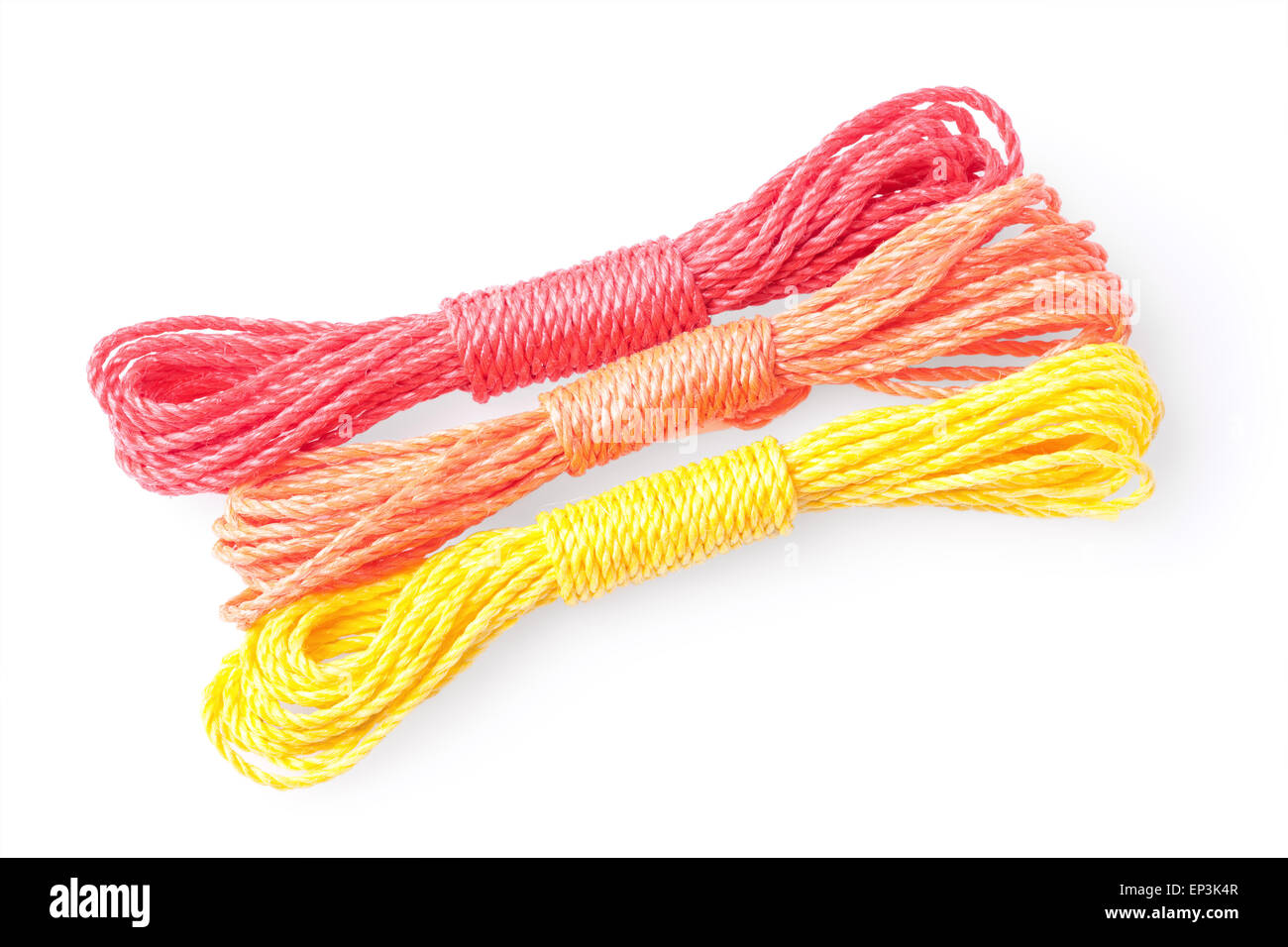 three color ropes isolated on white background Stock Photo - Alamy