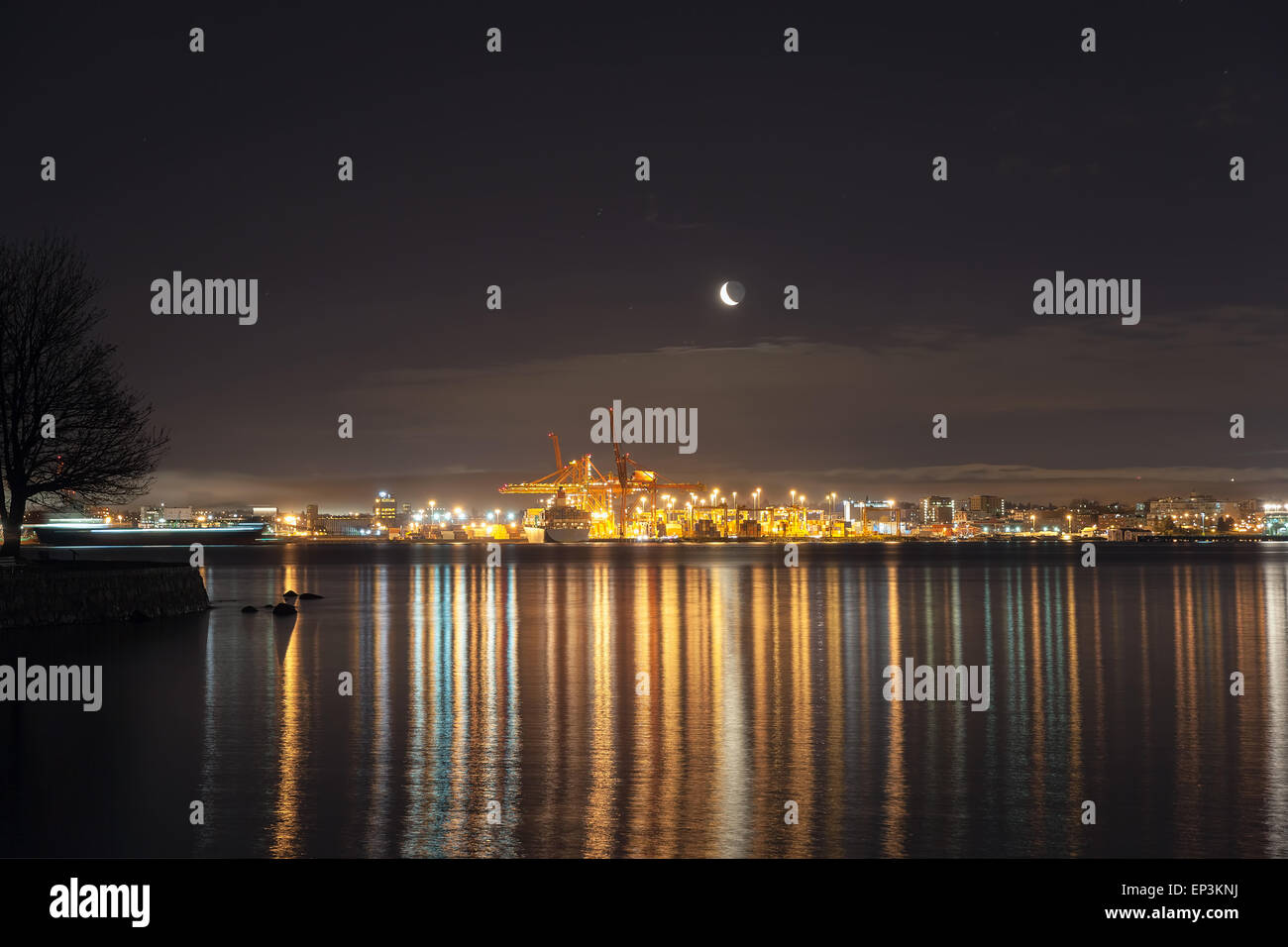 Moonrise OVer Port of Vancouver British Columbia Canada at Night Stock Photo