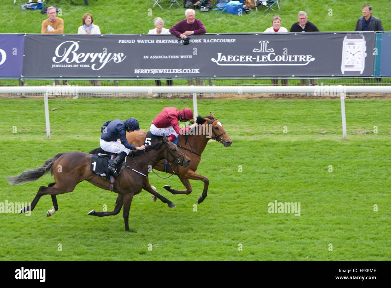 York, UK. 13th May, 2015. Frankie Dettori (in red ) wins the fourth race of the day - The Tattersalls Musidora Stakes - on Star of Seville, holding off the fast finishing Together Forever (number 1) at the Dante Festival at York. Horse-racing at York  UK Credit:  John Fryer/Alamy Live News Stock Photo