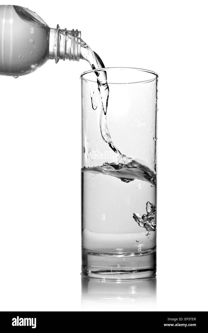 water pouring into glass from bottle isolated on white Stock Photo Alamy