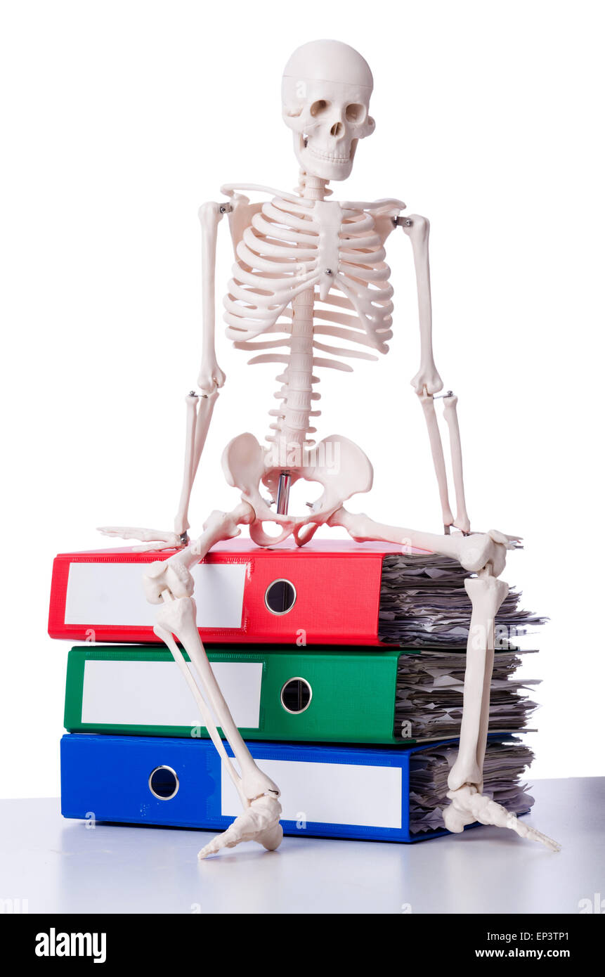 Skeleton with pile of files on white Stock Photo - Alamy