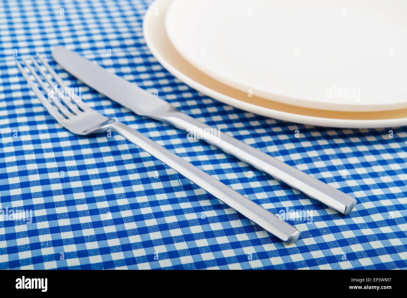 Table setting with knife and fork Stock Photo - Alamy
