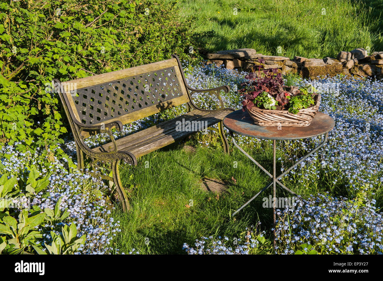 Idyllic Garden With Garden Bench And Small Bistro Table Nestled By Stock Photo Alamy