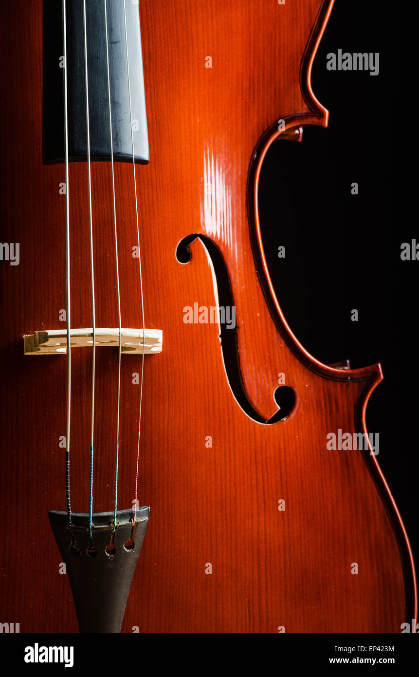 Violin in dark room - music concept Stock Photo - Alamy