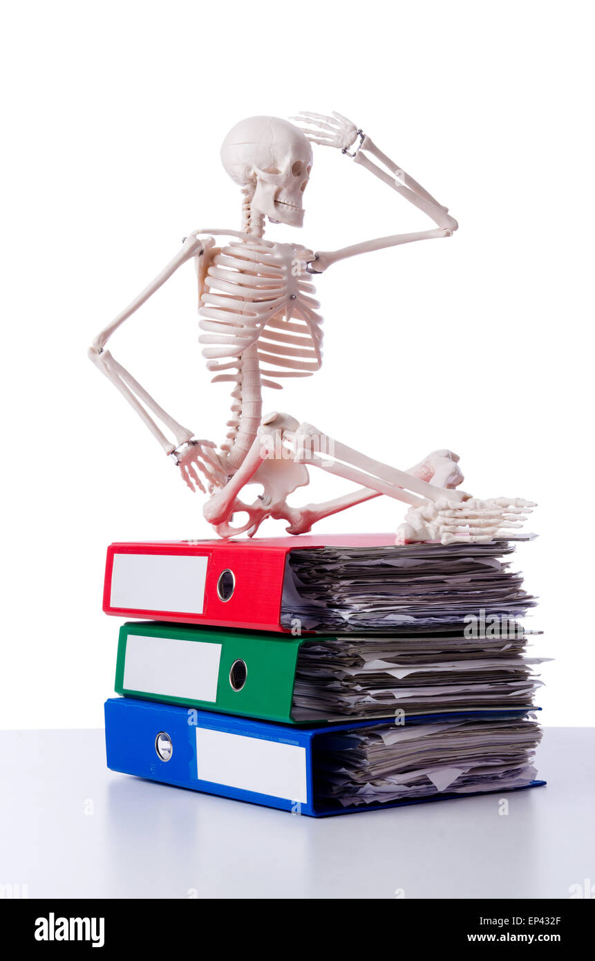 Skeleton with pile of files on white Stock Photo - Alamy
