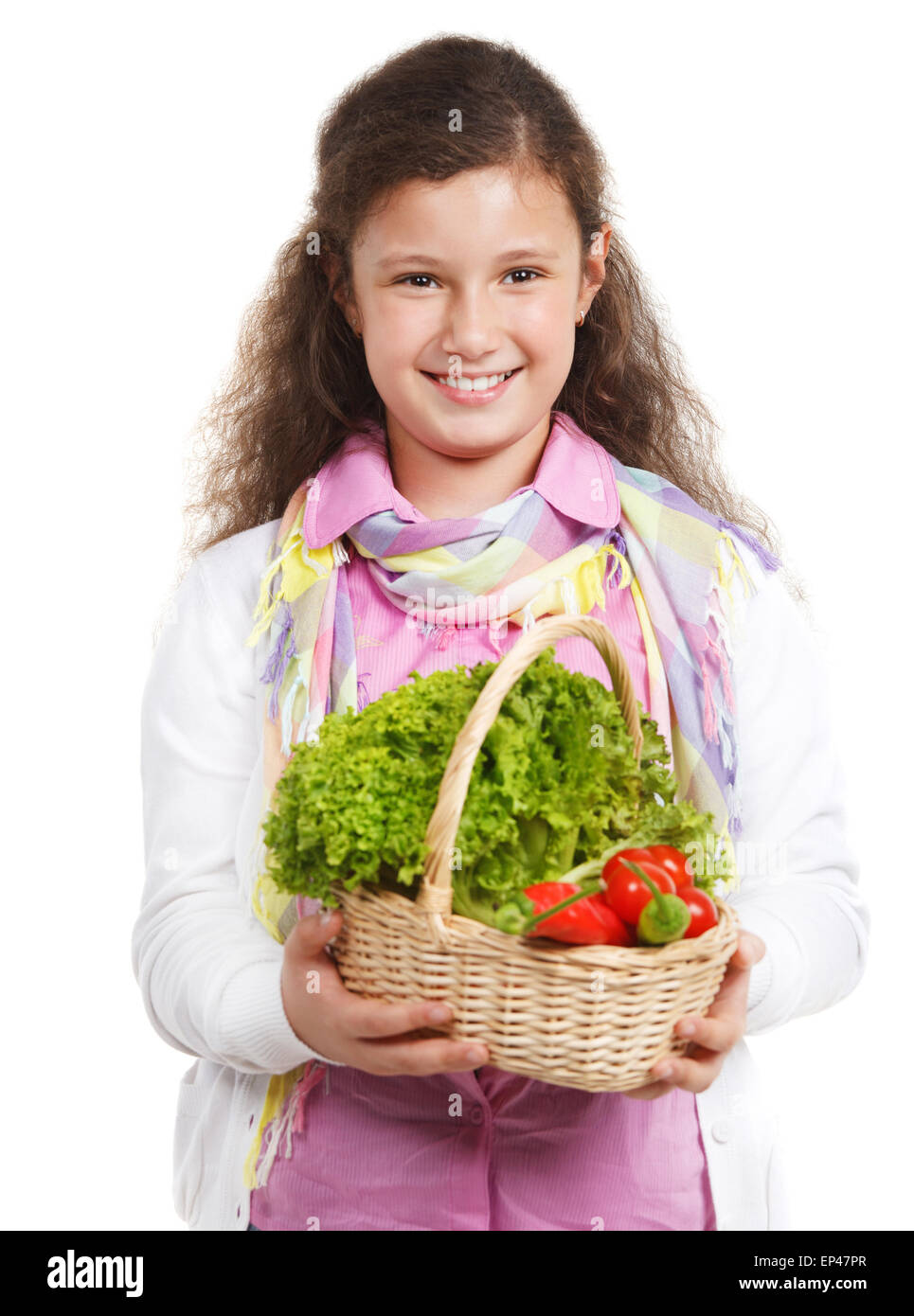 Smiling little girl with basket of vegetables Stock Photo - Alamy