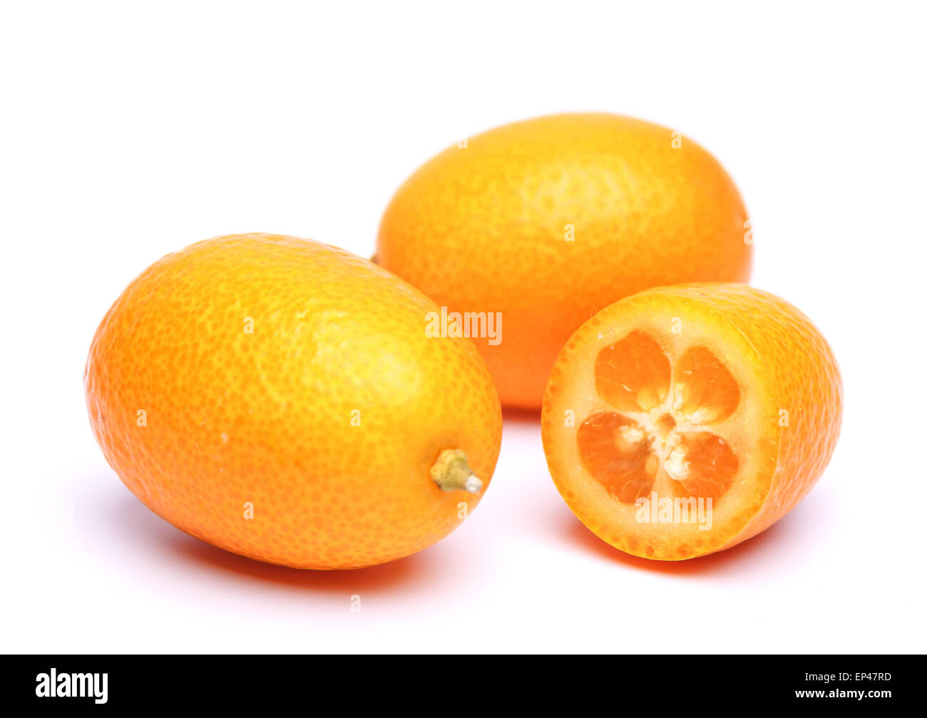 ripe kumquat on a white background Stock Photo Alamy