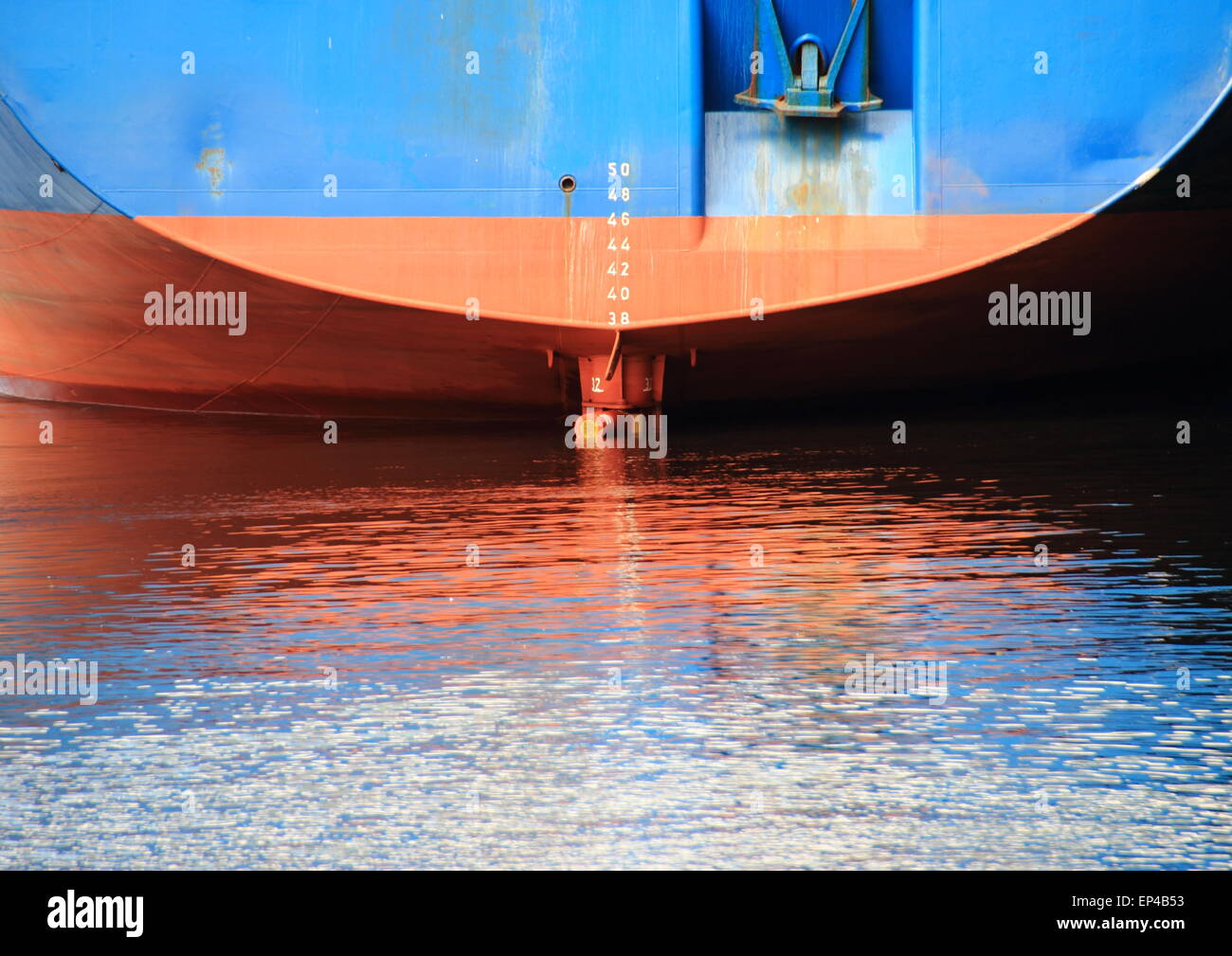 Ship stern with reflection in harbor water Stock Photo Alamy