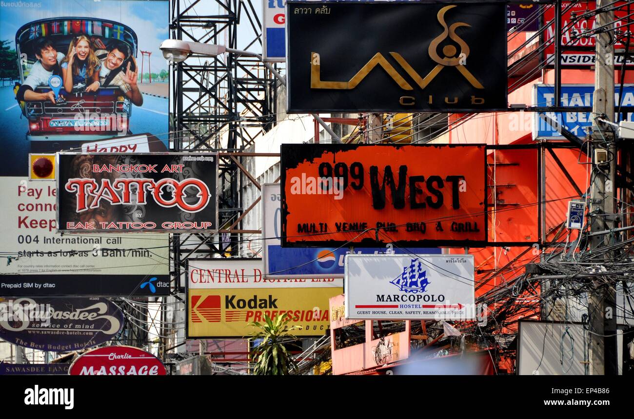 Bangkok, Thailand:  A mélange of shop signs, mostly in English to appeal to foreign tourists on Khao San Road Stock Photo