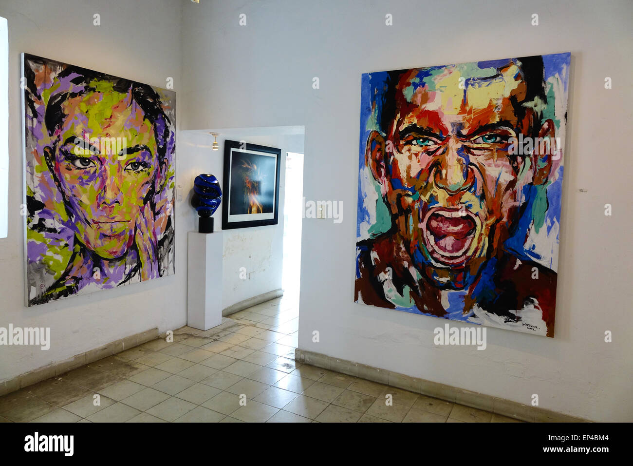Artworks, including large paintings by Diego Luz, displayed at Galleria Corsica, Puerto Vallarta, Mexico Stock Photo