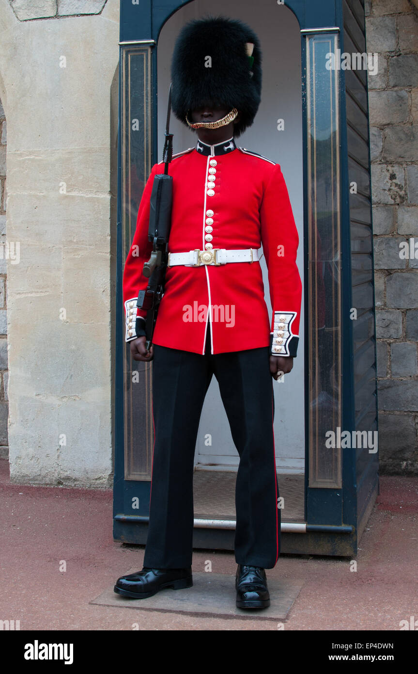 Queen's Guard with gun at the Windsor Castle, England Stock Photo