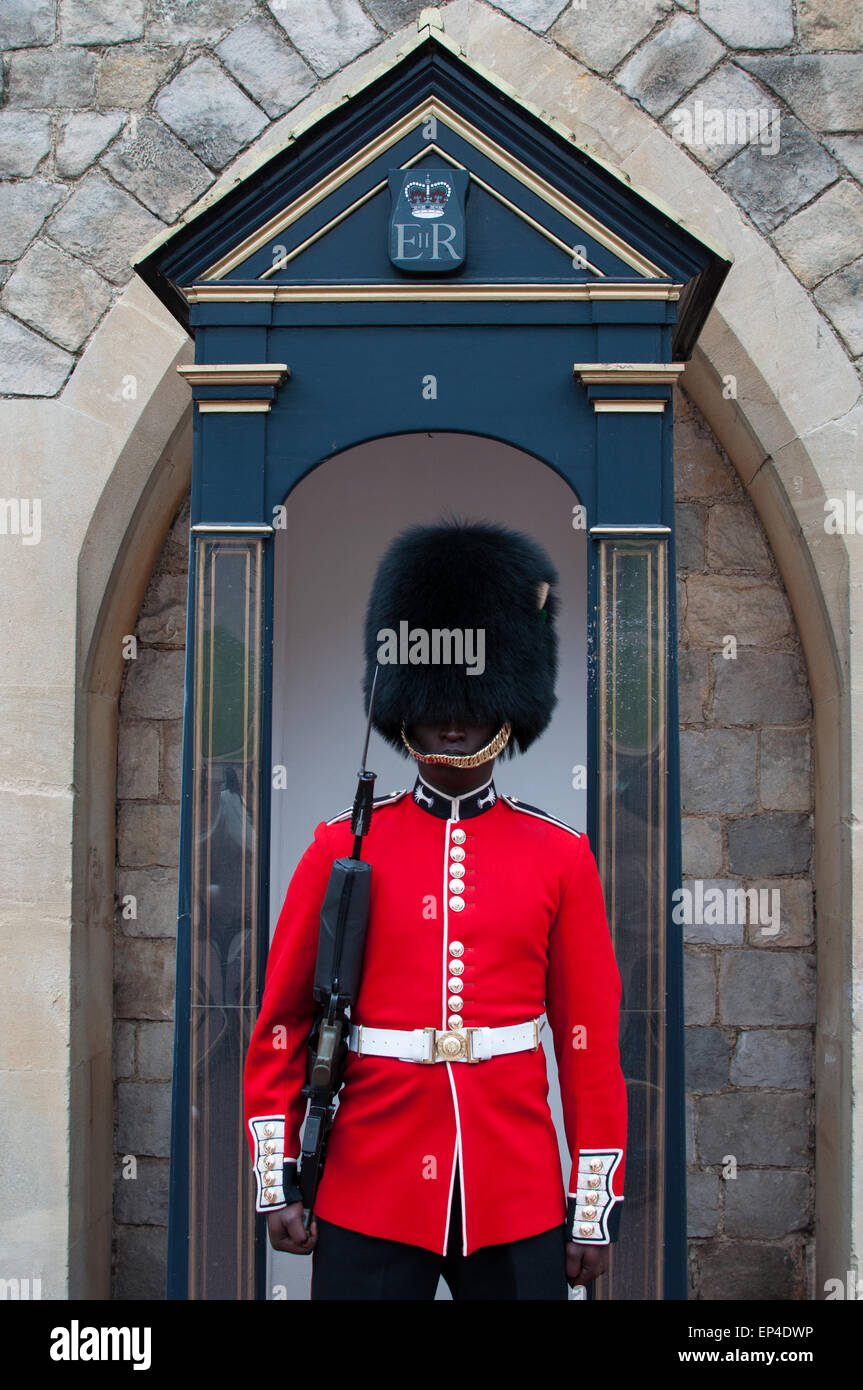Queen's Guard with gun at the Windsor Castle, England Stock Photo
