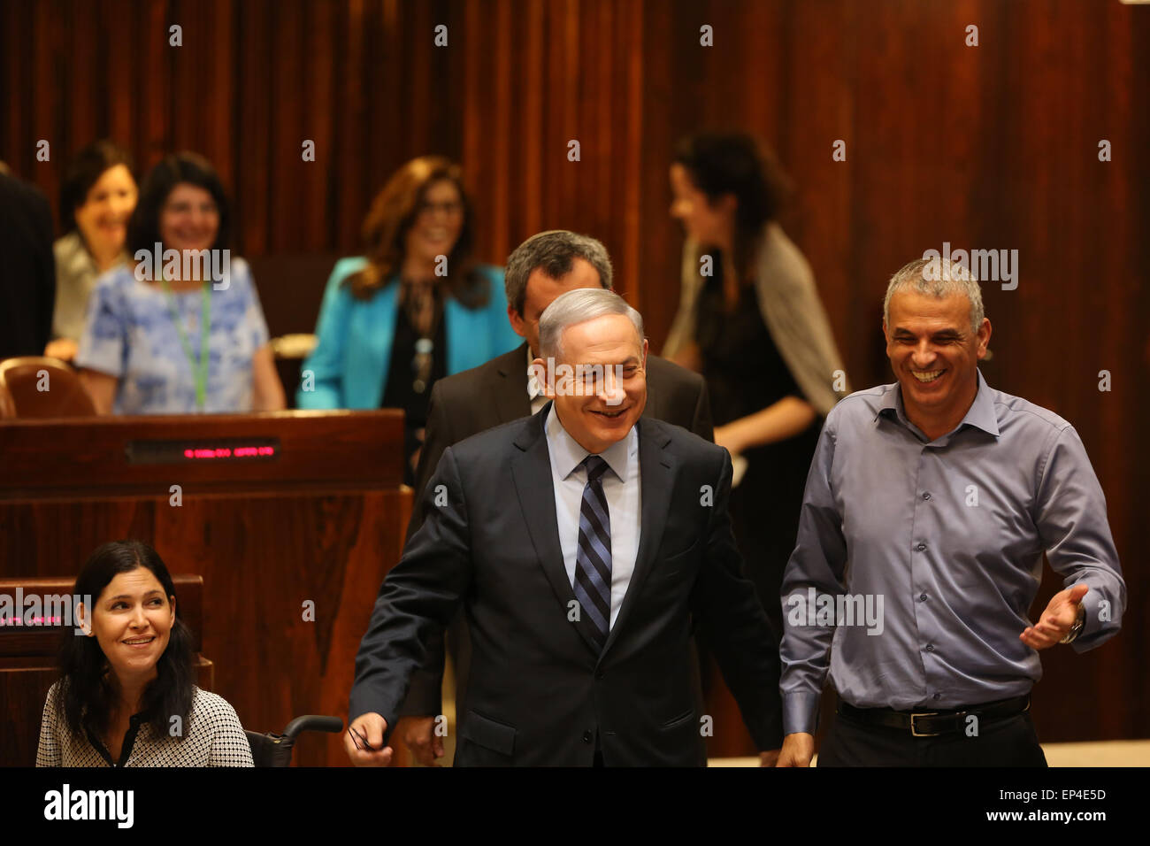(150513) -- JERUSALEM, May 13, 2015 (Xinhua) -- Israeli Prime Minister Benjamin Netanyahu (C, front) reacts during a vote in the Israeli Knesset (parliament) in Jerusalem, on May 13, 2015. The Israeli Knesset (parliament) Wednesday voted in favor of a bill that will empower Prime Minister Benjamin Netanyahu to enlarge the number of cabinet positions in the new coalition government. (Xinhua/JINI) Stock Photo
