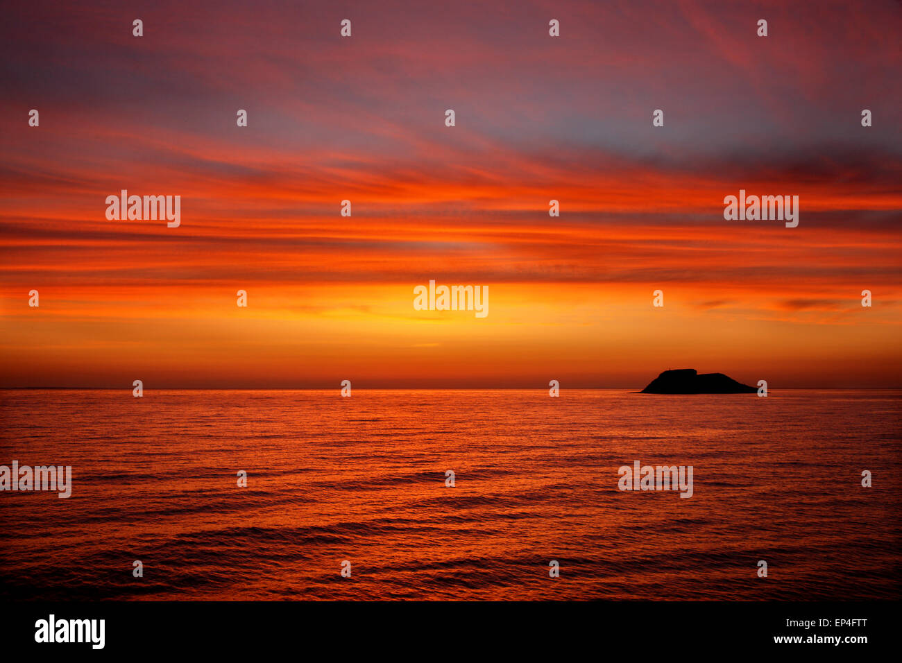 Sunrise in the Aegean, somewhere between Lemnos & Agios Efstratios (Ai Stratis) islands, North Aegean, Greece Stock Photo