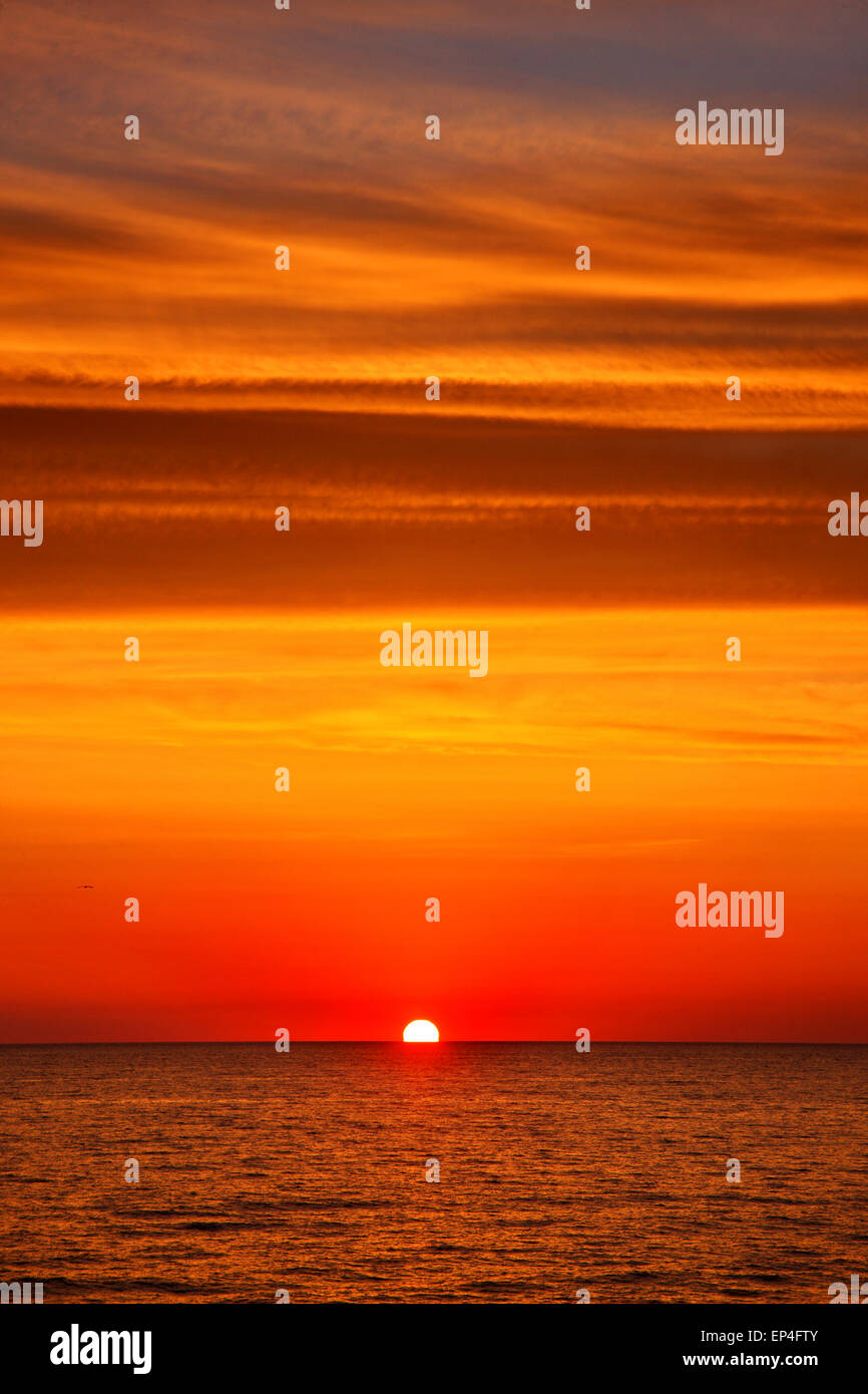 Sunrise in the Aegean, somewhere between Lemnos & Agios Efstratios (Ai Stratis) islands, North Aegean, Greece Stock Photo