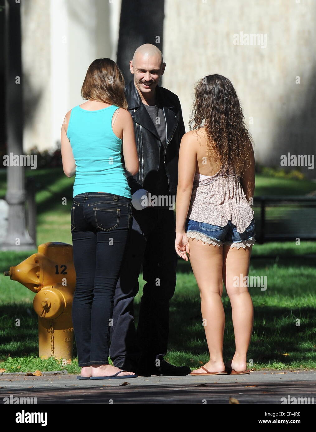 James Franco spotted chatting it up with college students at USC campus during break on the set of 'Zeroville' filming in Los Angeles. The actor was also seen wearing a cast on his hands.  Featuring: James Franco Where: Los Angeles, California, United States When: 09 Nov 2014 Credit: Cousart/JFXimages/WENN.com Stock Photo