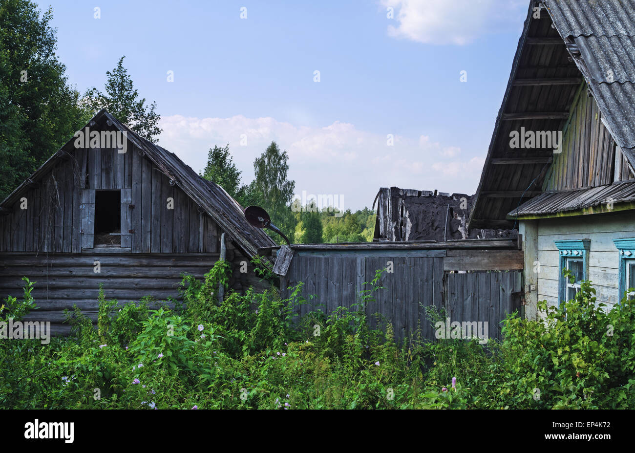Village landscape - old house and sheds Stock Photo - Alamy