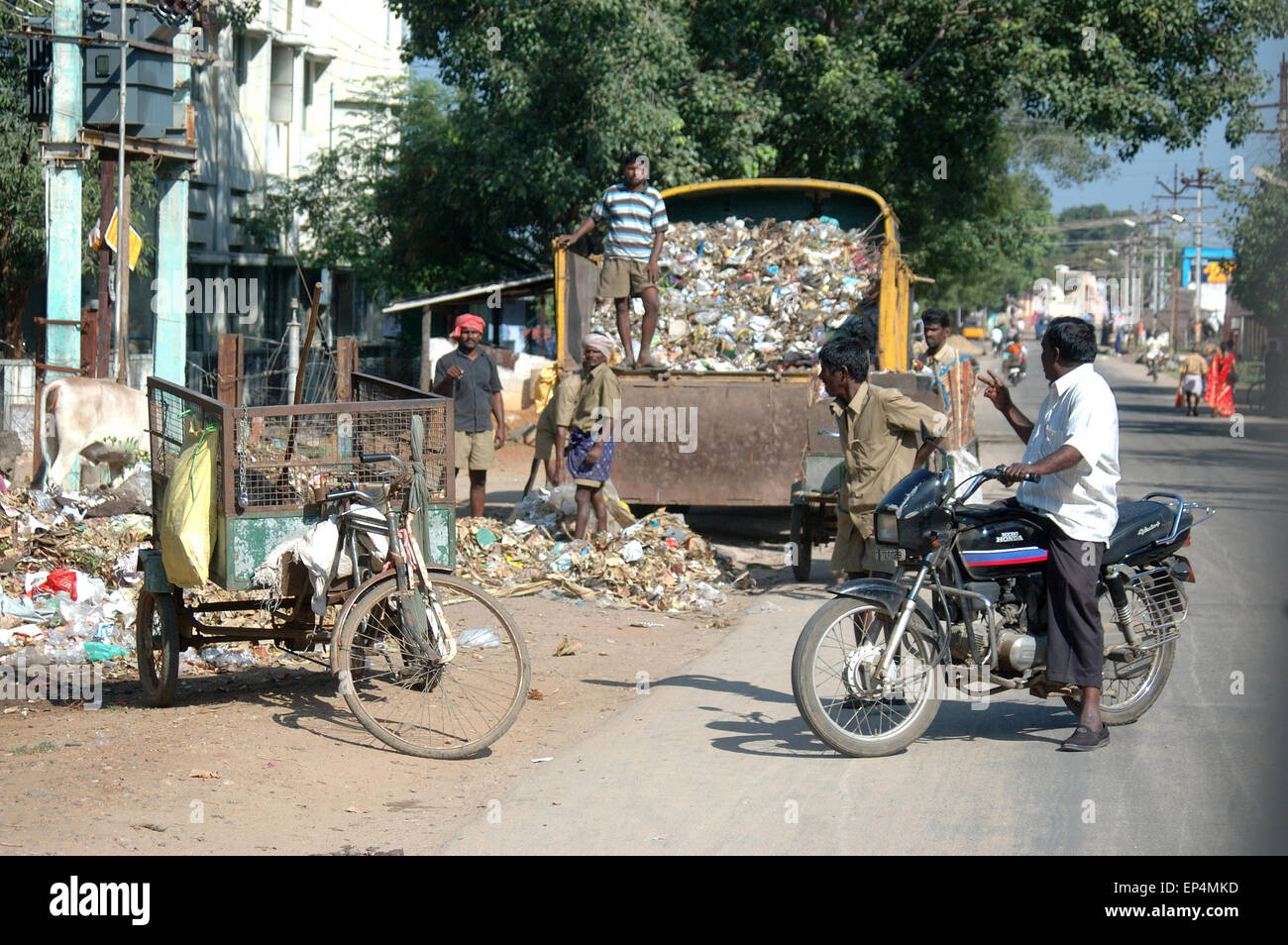 tamil-nadu-india-circa-2009-garbage-collectors-pause-in-their-work