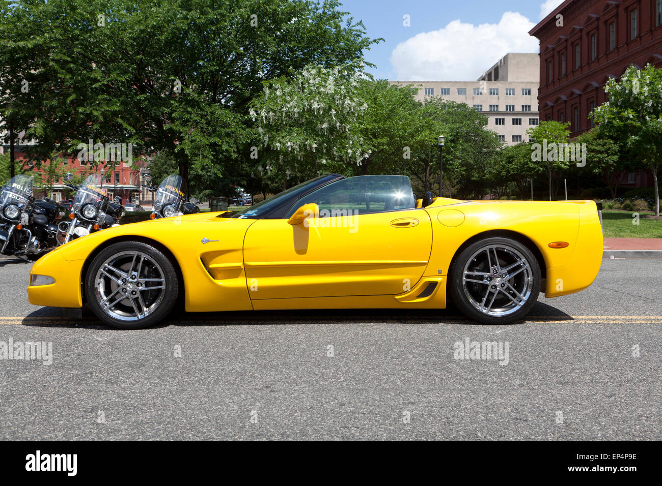2003 Yellow Chevy Corvette convertible profile view - USA Stock Photo