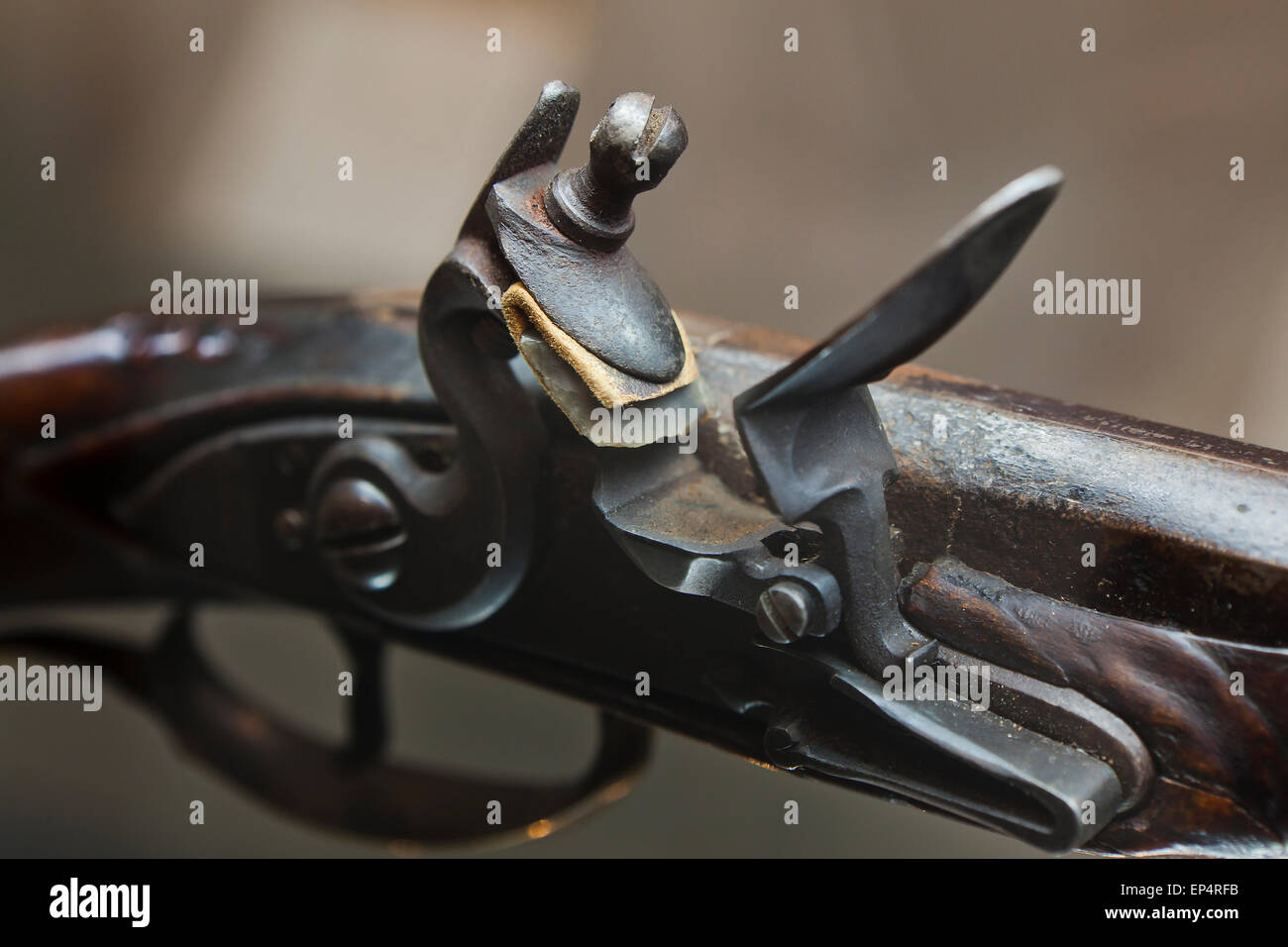 Flintlock mechanism on early 19th century American rifle (musket gun) - USA Stock Photo