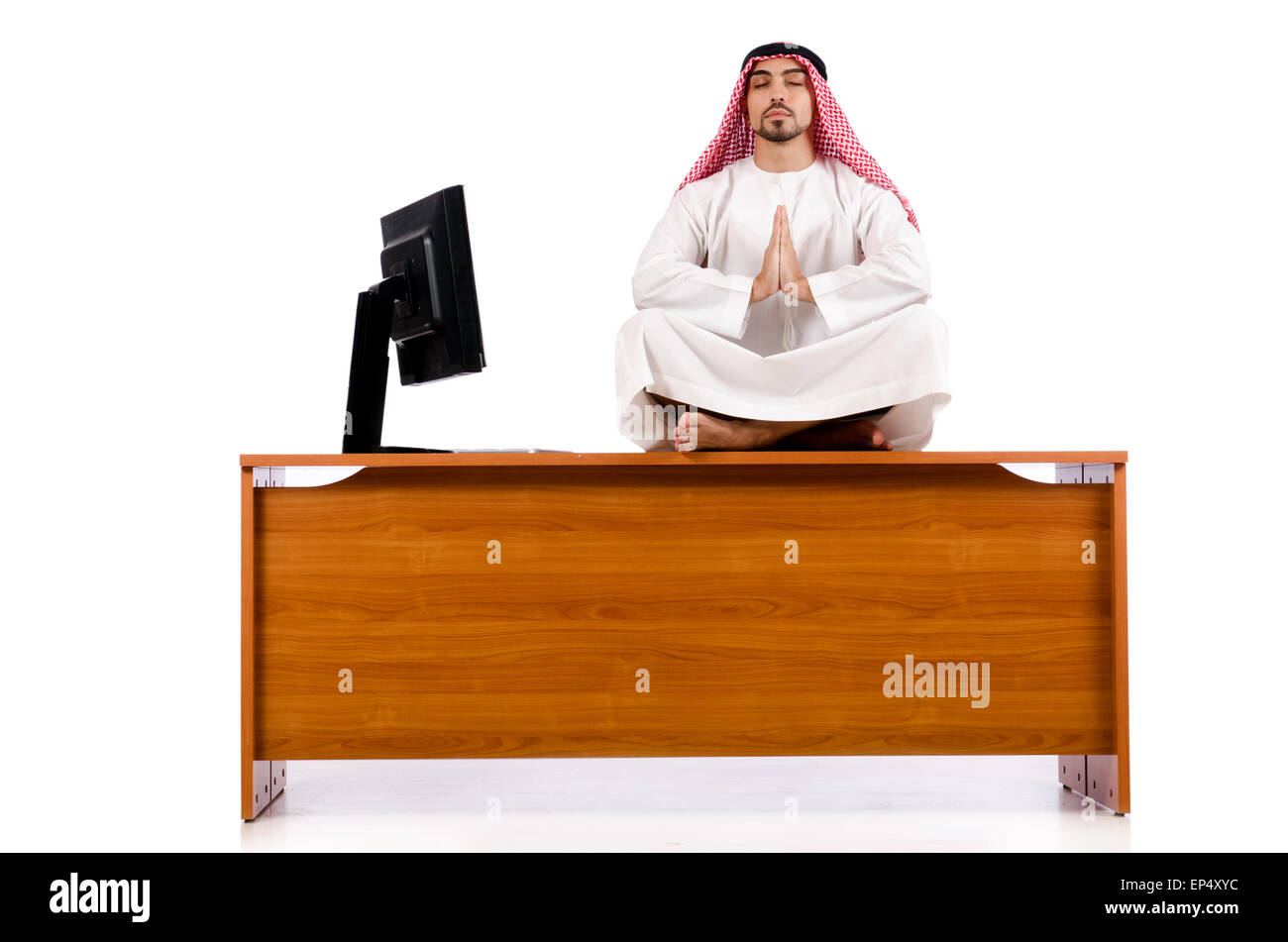 Arab man sitting at his desk Stock Photo - Alamy