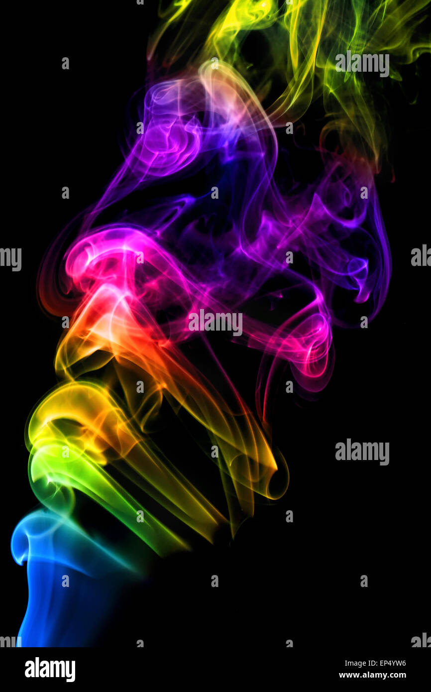 colorful smoke on black background Stock Photo - Alamy