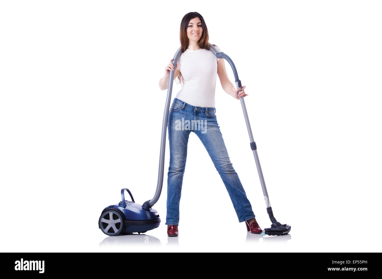 Young woman with vacuum cleaner on white Stock Photo - Alamy