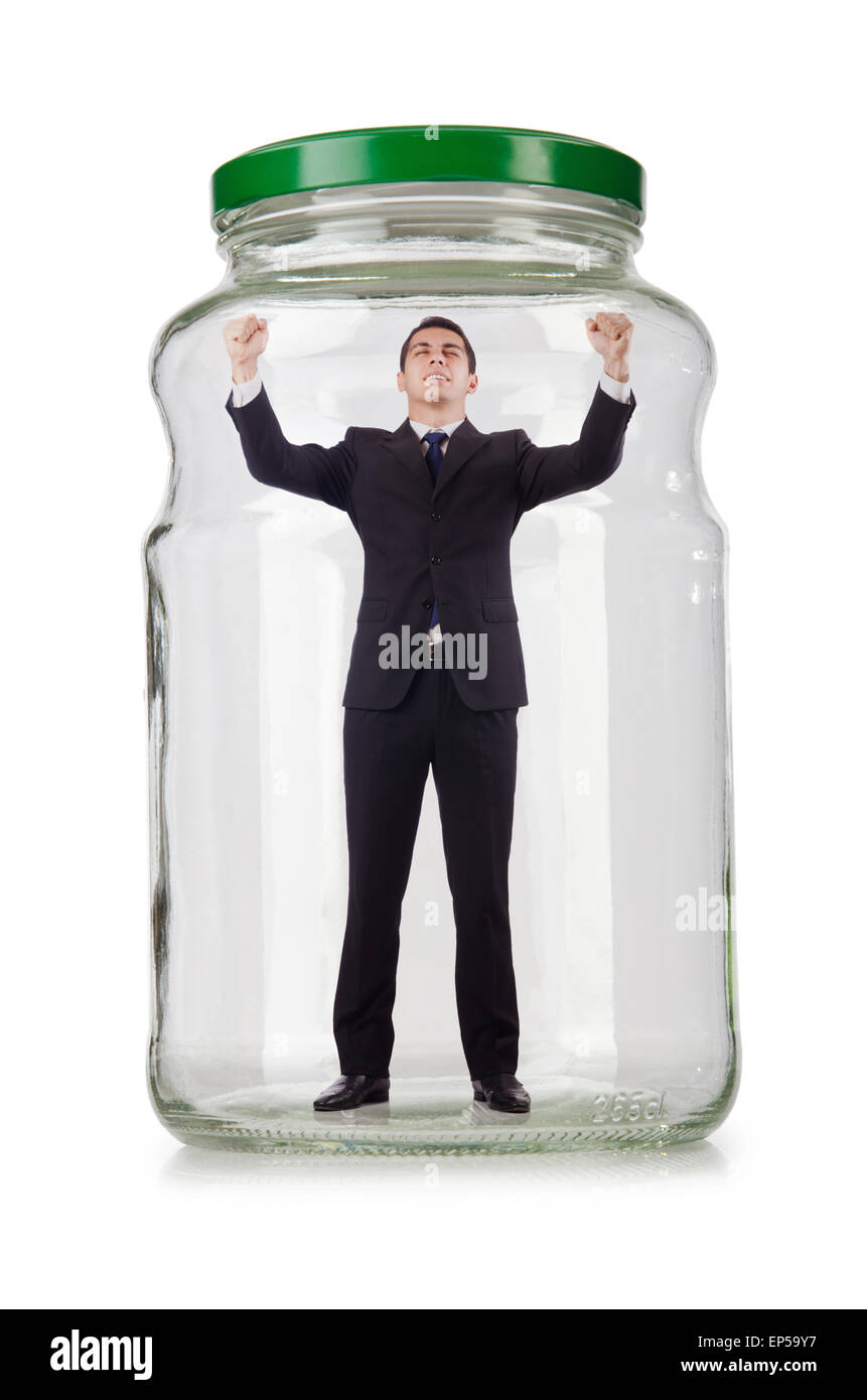 Young businessman in glass jar Stock Photo