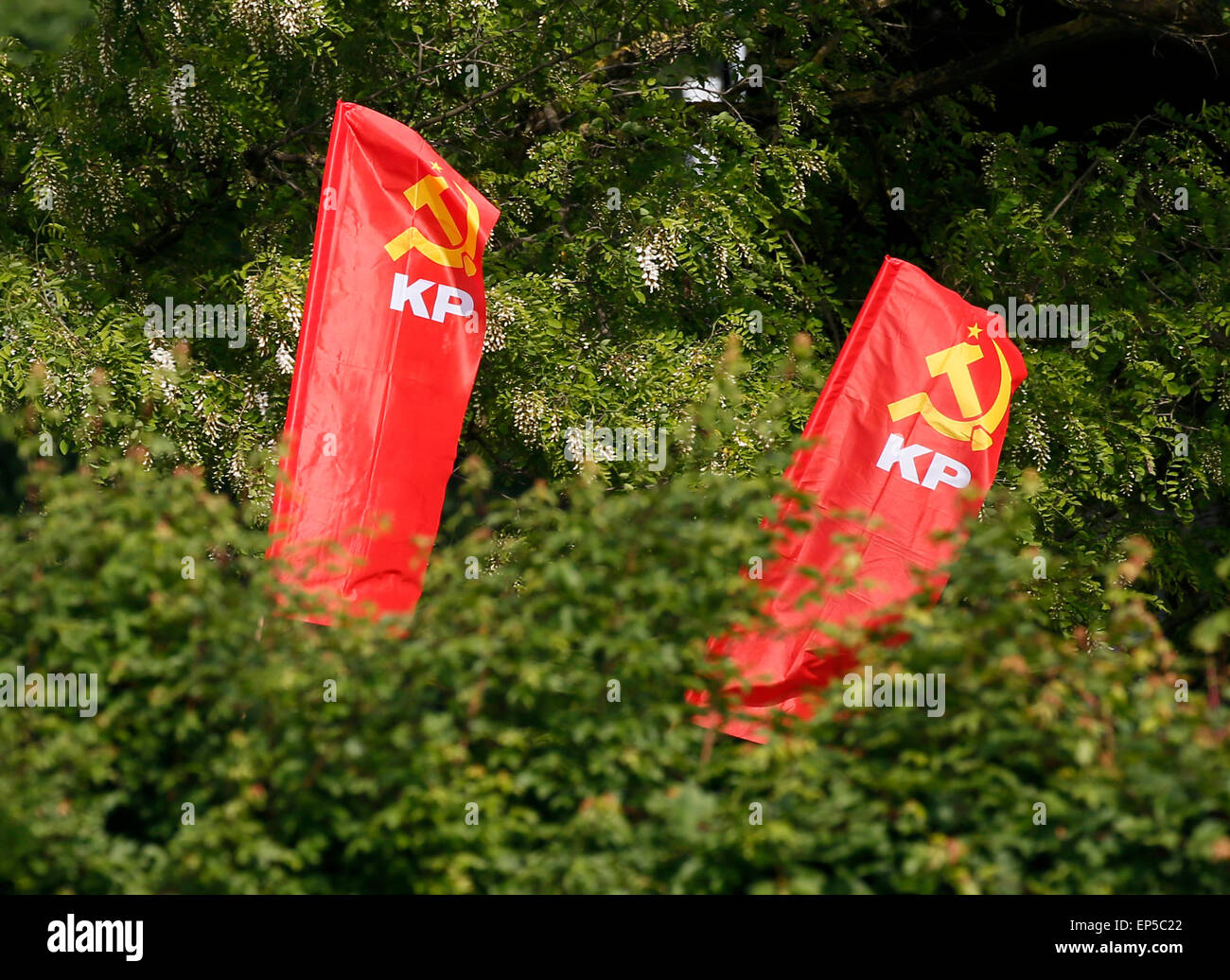 Flags of the KP wave during a demonstration against an event with the Turkish President Recep Tayyip Erdogan in Karlsruhe, Germany, 10 May 2015. Several people were injured in clashes between supporters and opponents of President Recep Tayyip Erdogan ahead of a visit by the Turkish head of state to the German city of Karlsruhe. The controversial visit is being billed as a meeting with youth groups but is widely seen as a campaign stop ahead of parliamentary elections due in Turkey on 07 June. According to organizers, 14,000 people have gathered for the event, with 3,000 waiting to be admitted Stock Photo