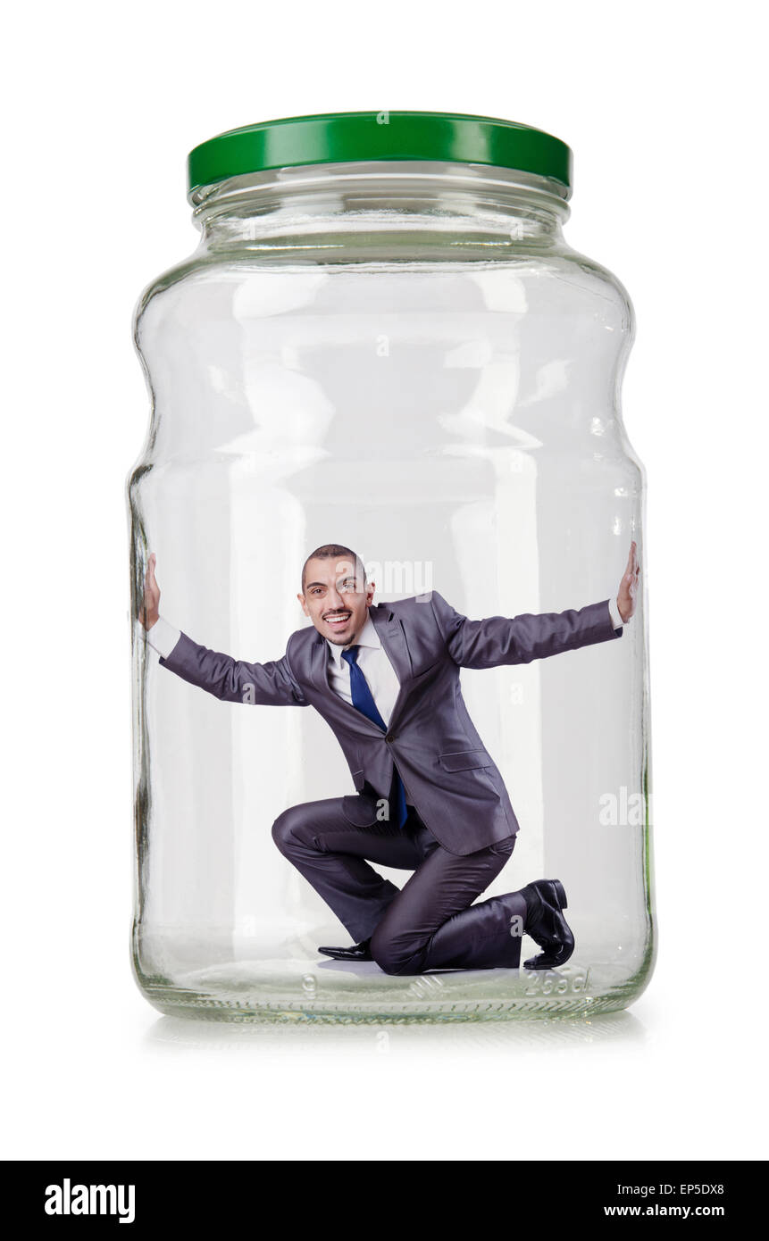 Young businessman in glass jar Stock Photo