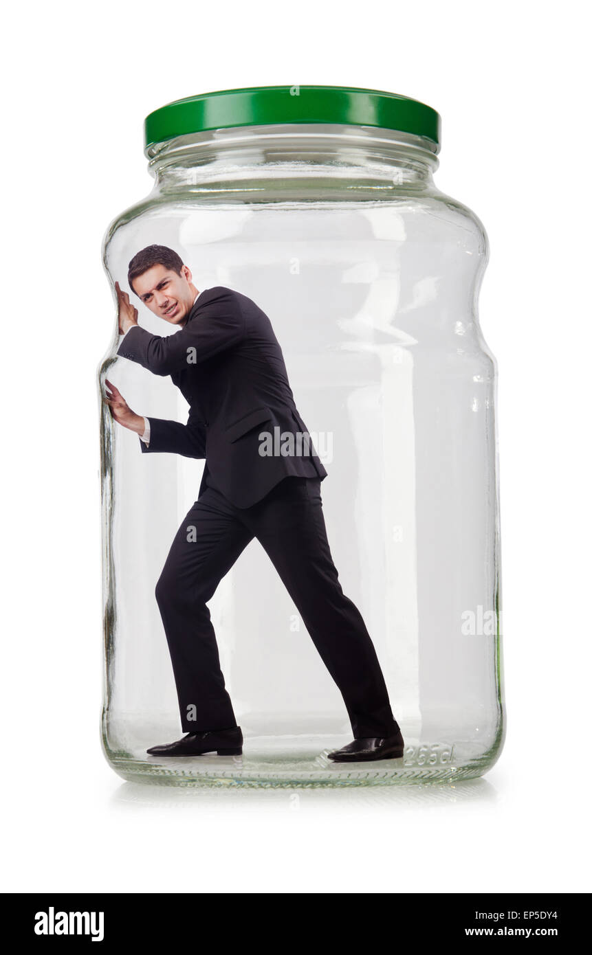 Young businessman in glass jar Stock Photo