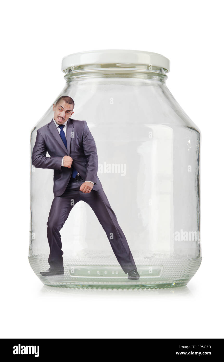 Young businessman in glass jar Stock Photo