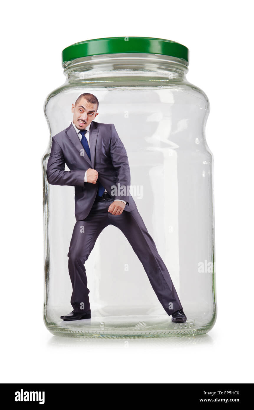 Young businessman in glass jar Stock Photo