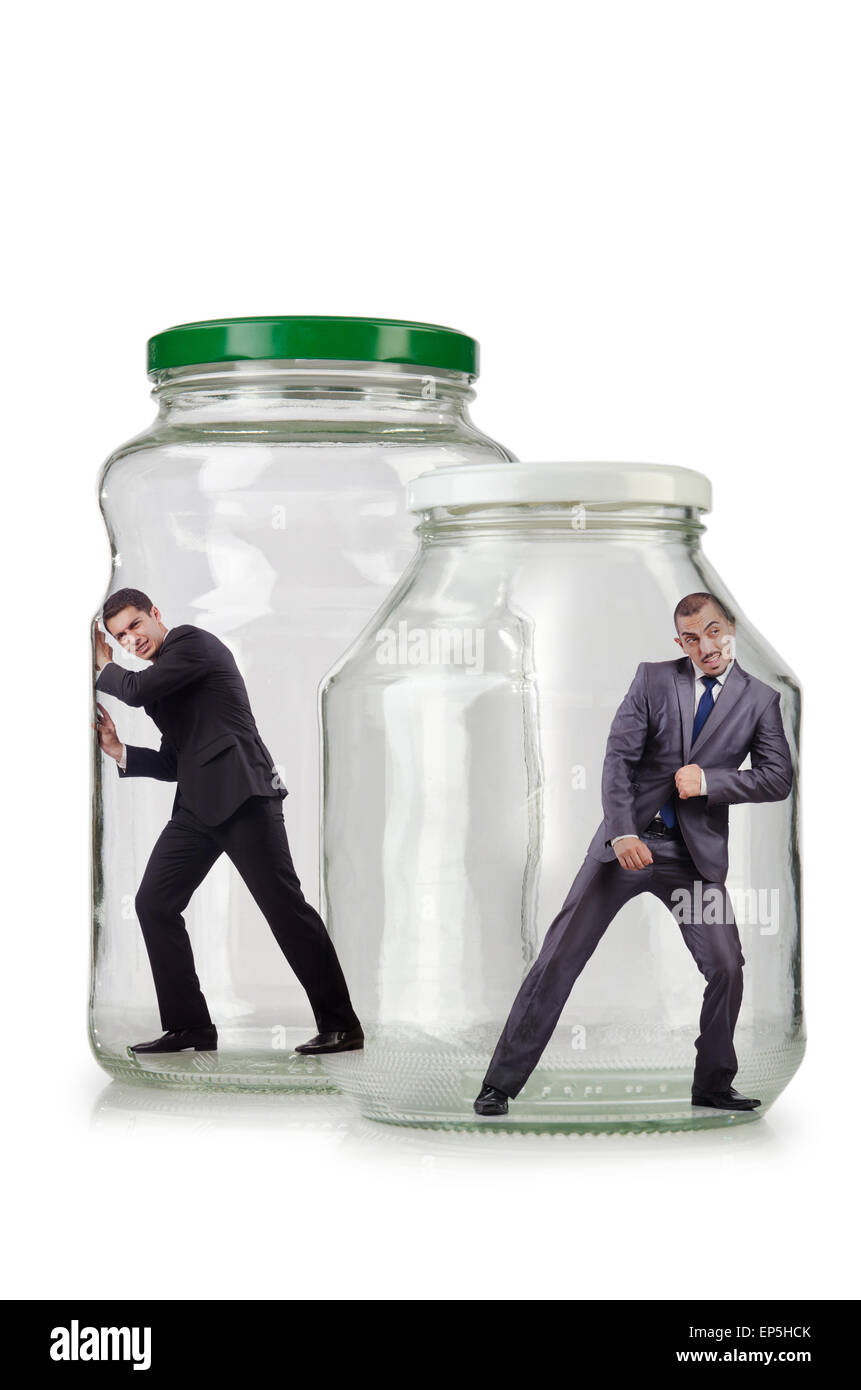 Young businessman in glass jar Stock Photo